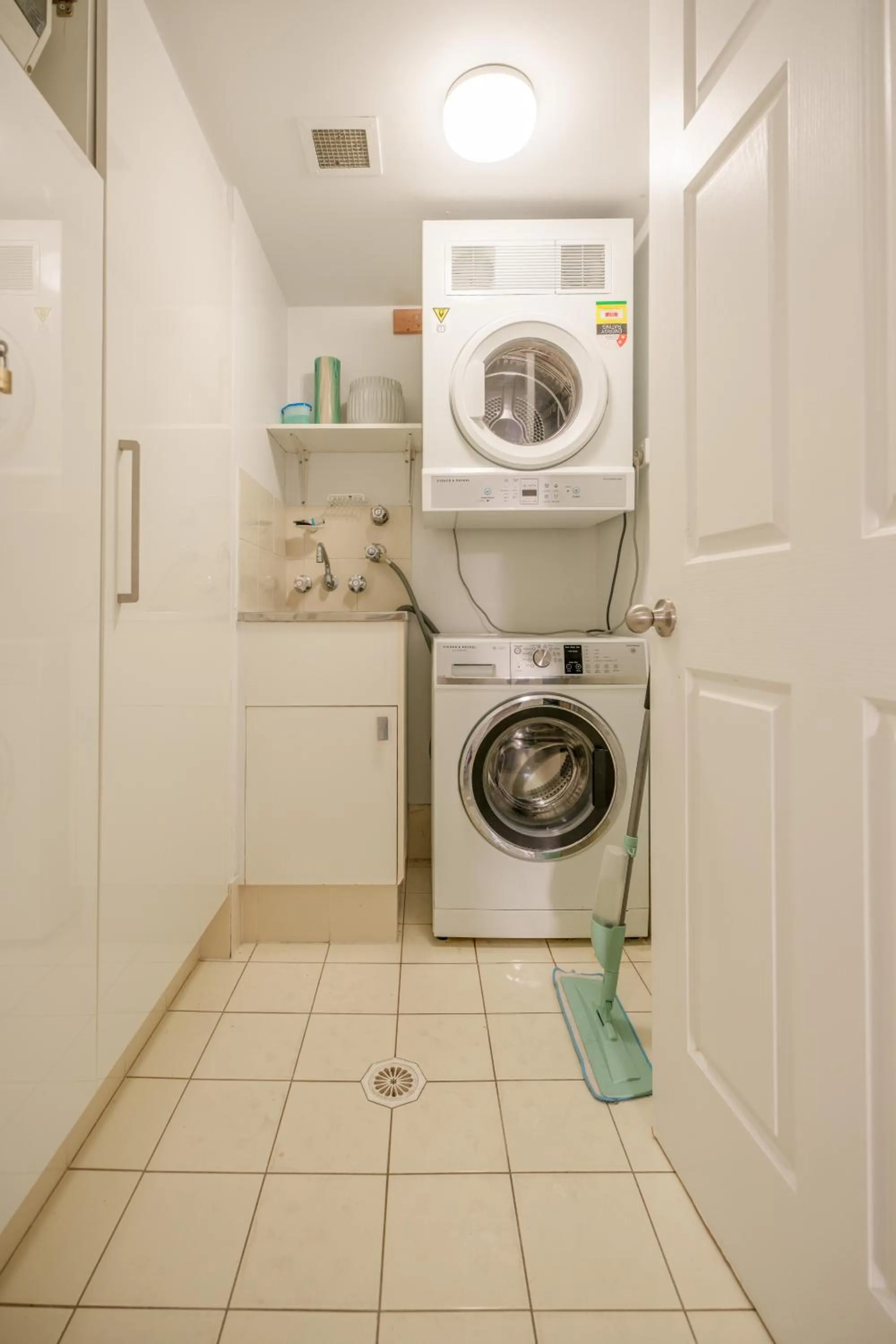 washing machine in La Grande Apartments