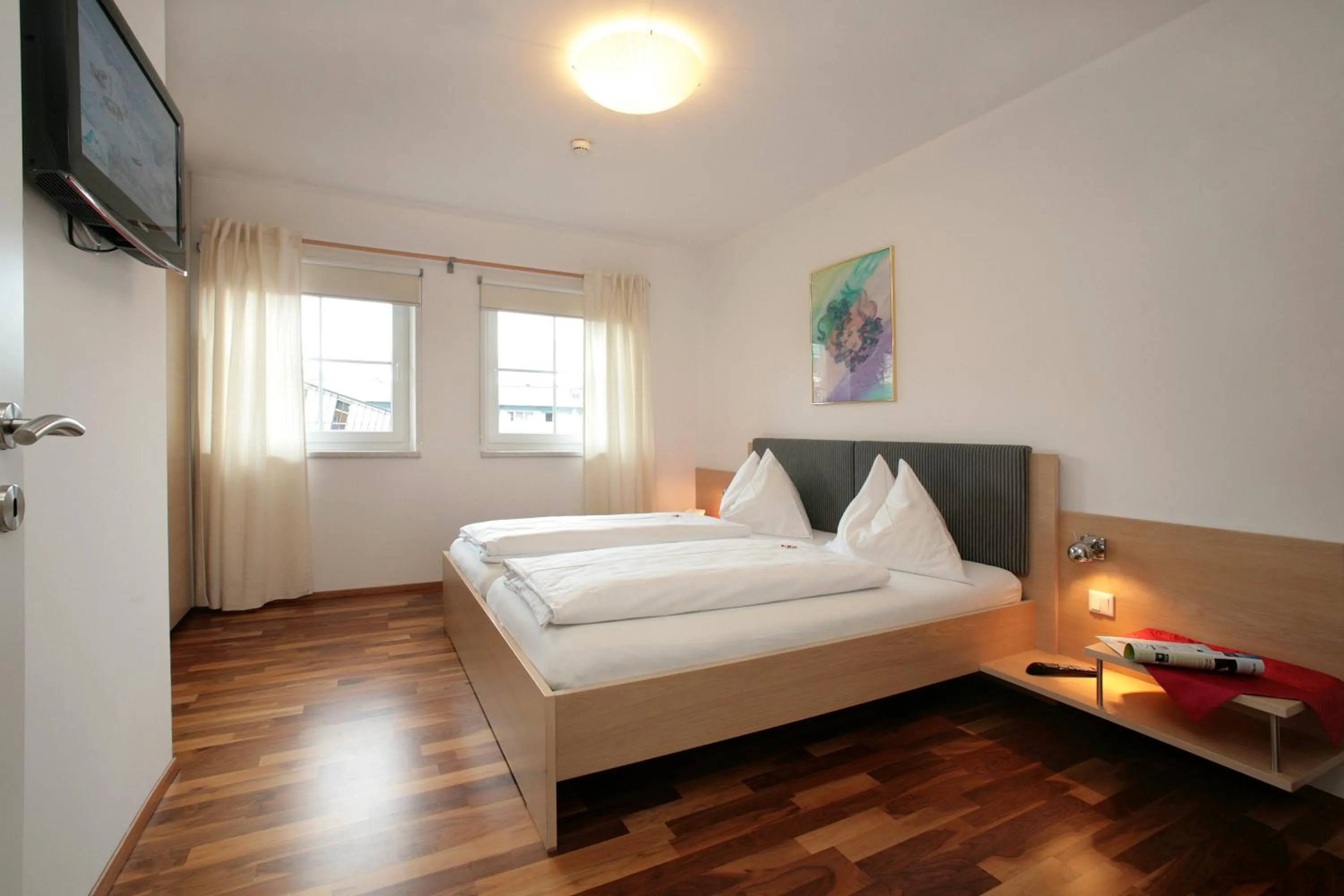 Bed in Aparthotel Waidmannsheil