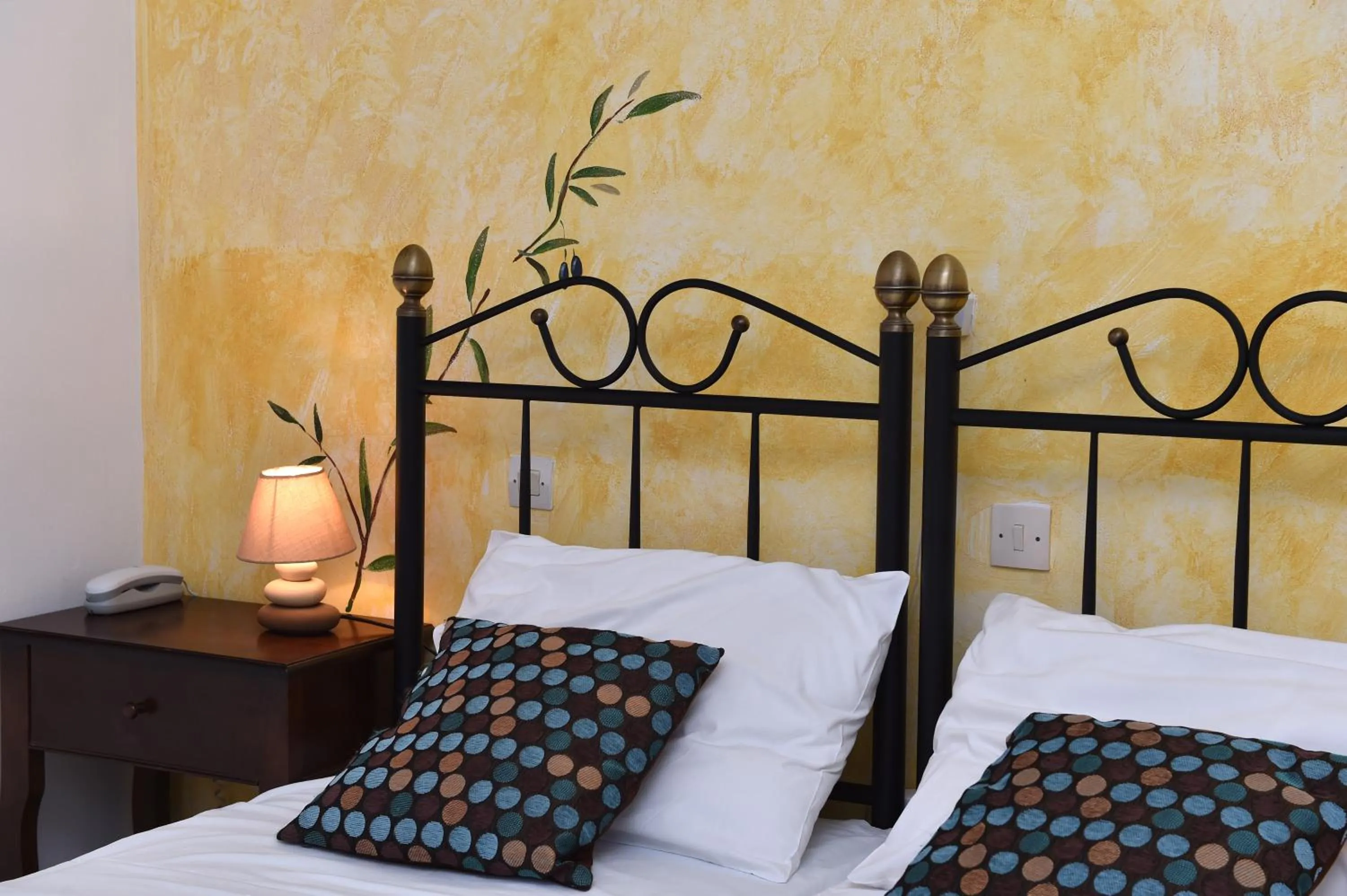 Bed in Aphrodite Boutique Hotel