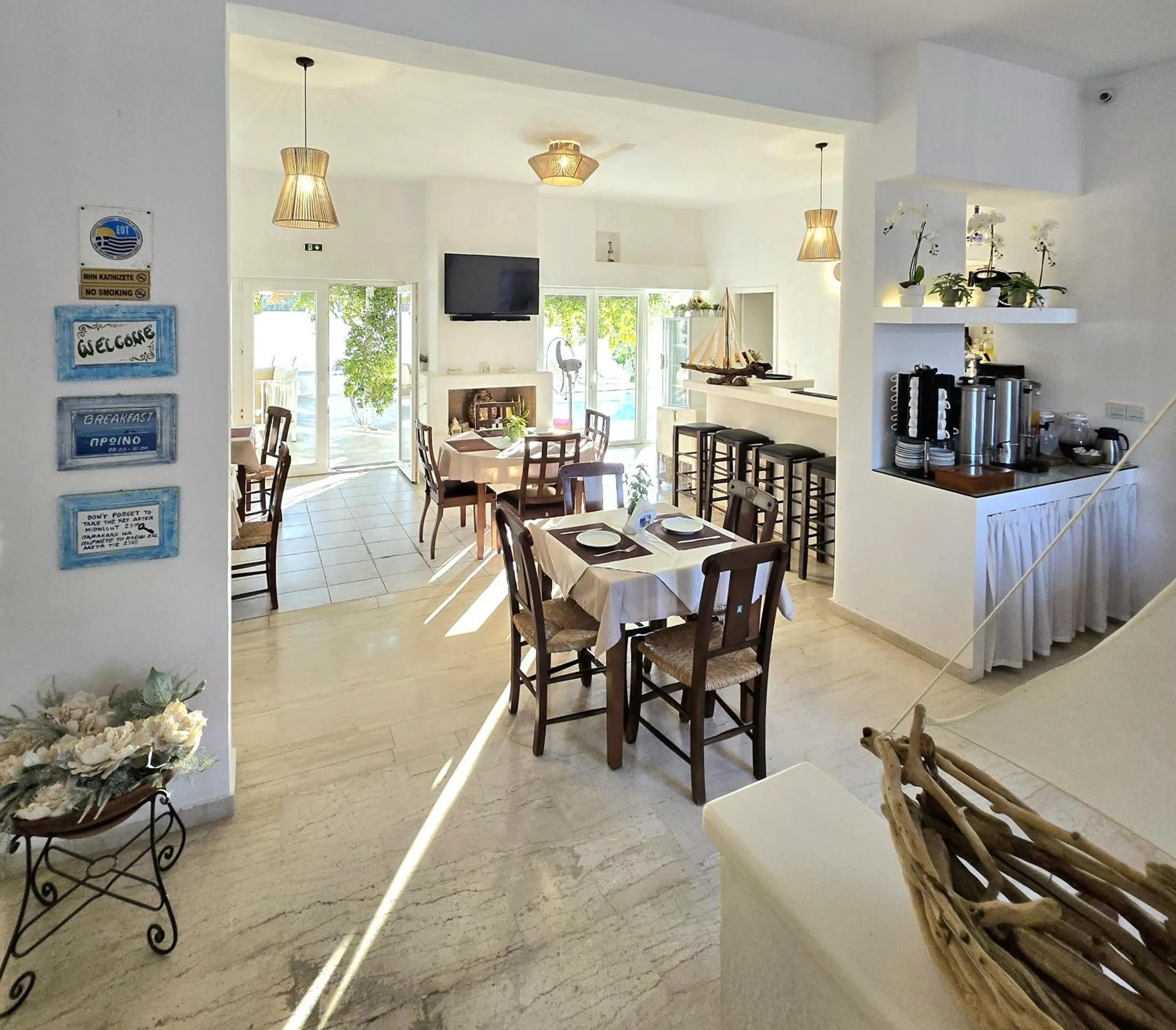 Communal lounge/ TV room in Aphrodite Boutique Hotel