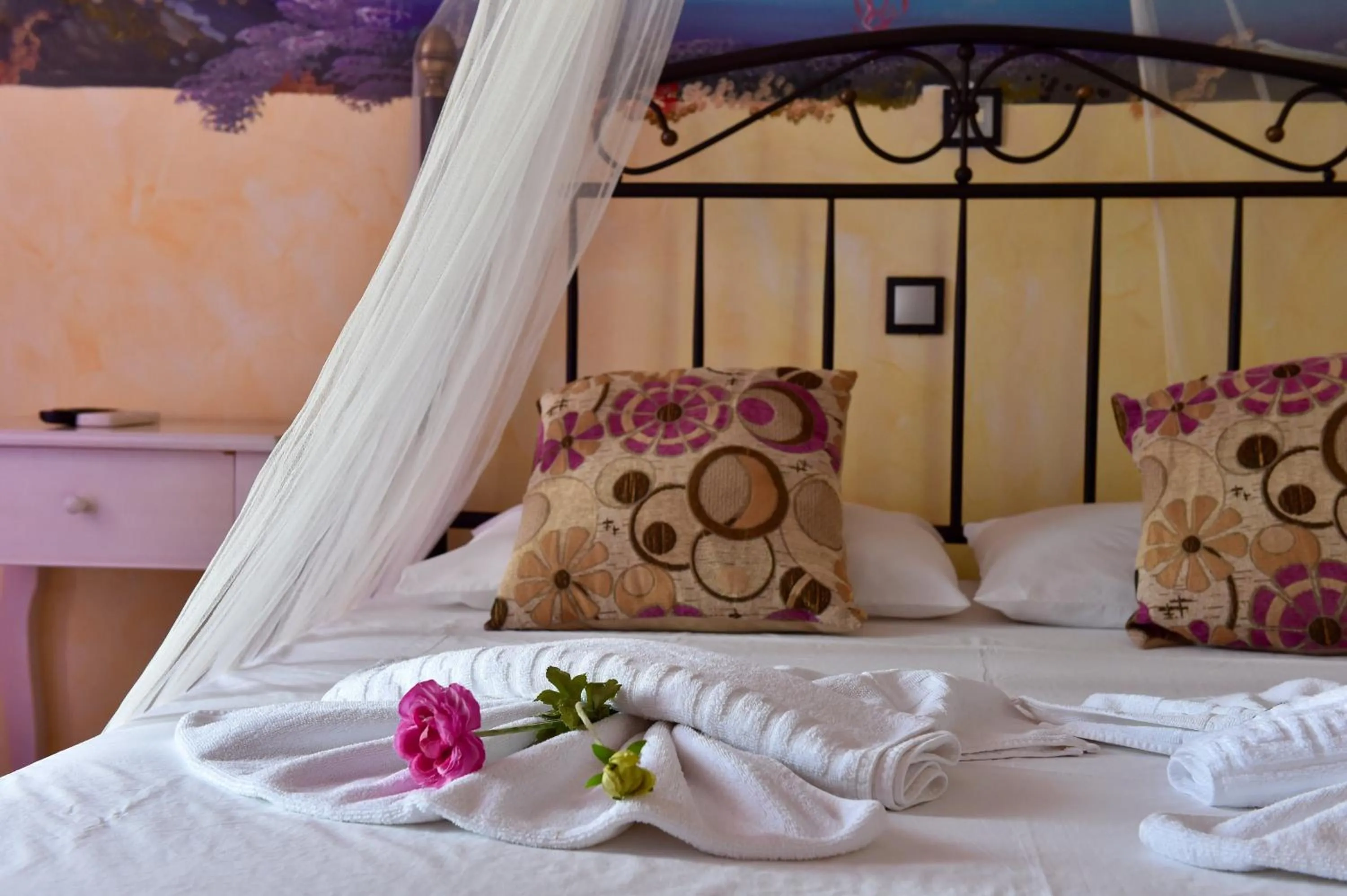 Bed in Aphrodite Boutique Hotel