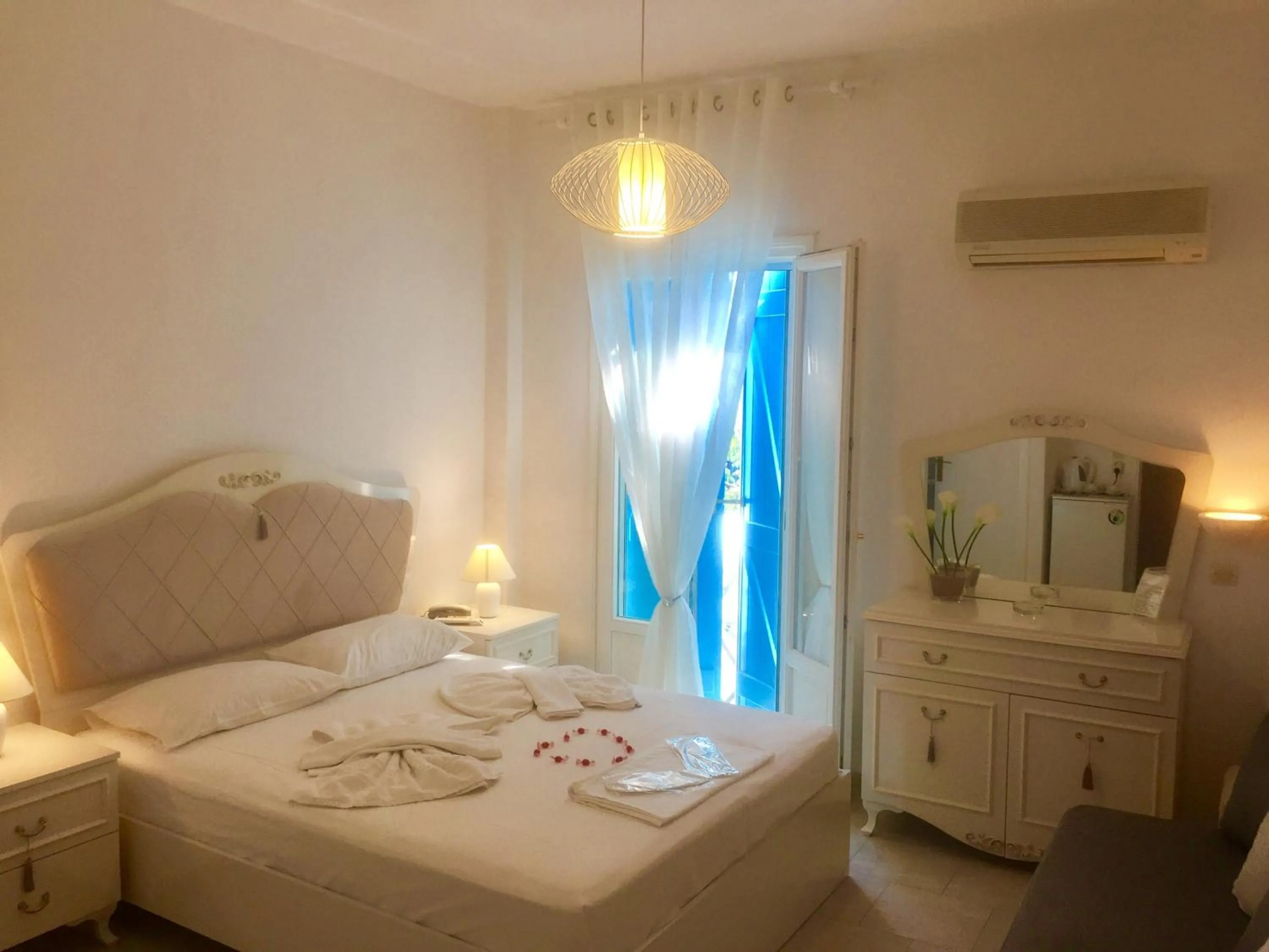 Photo of the whole room, Bed in Aphrodite Boutique Hotel