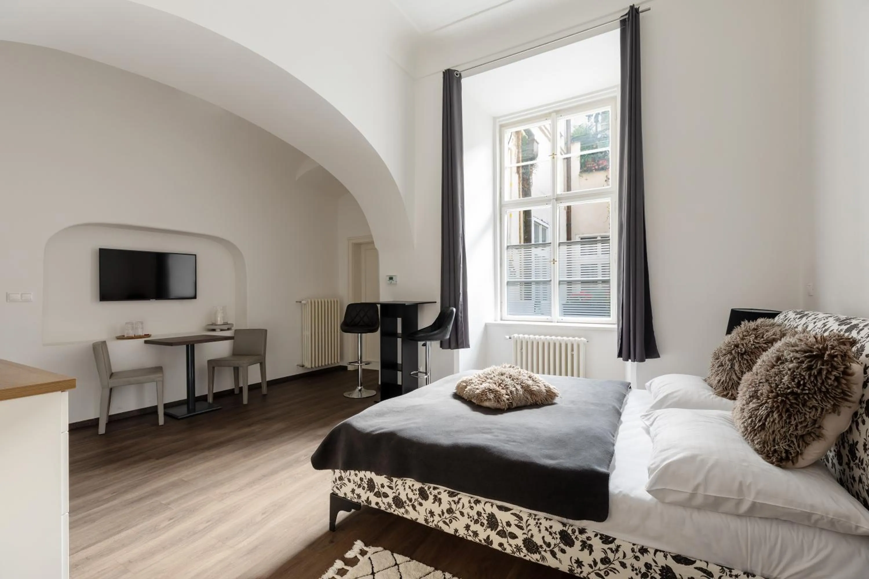 Bed in Old Town Square Residence by Emblem