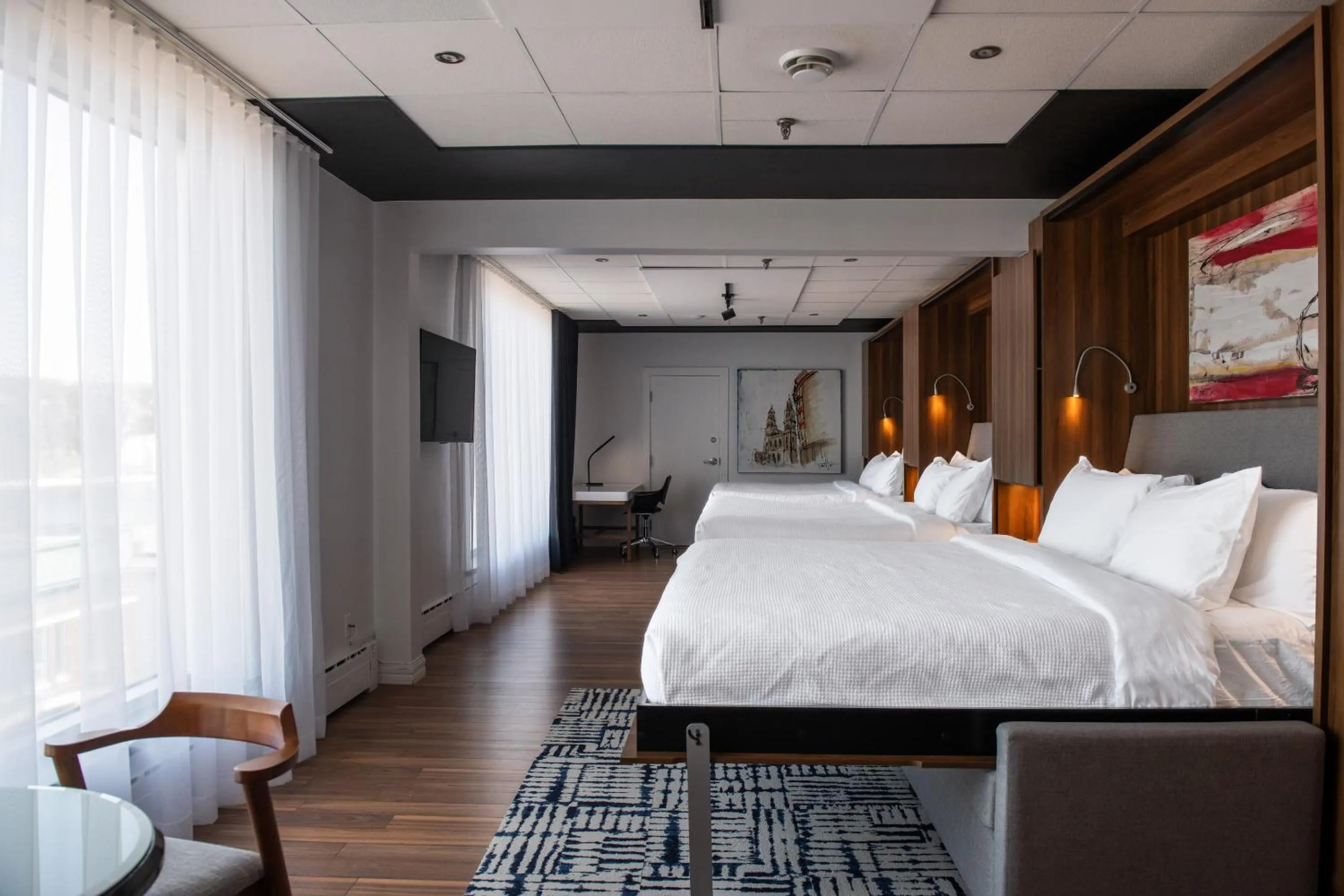 Bed in Hotel Chicoutimi, affilié à Hyvi