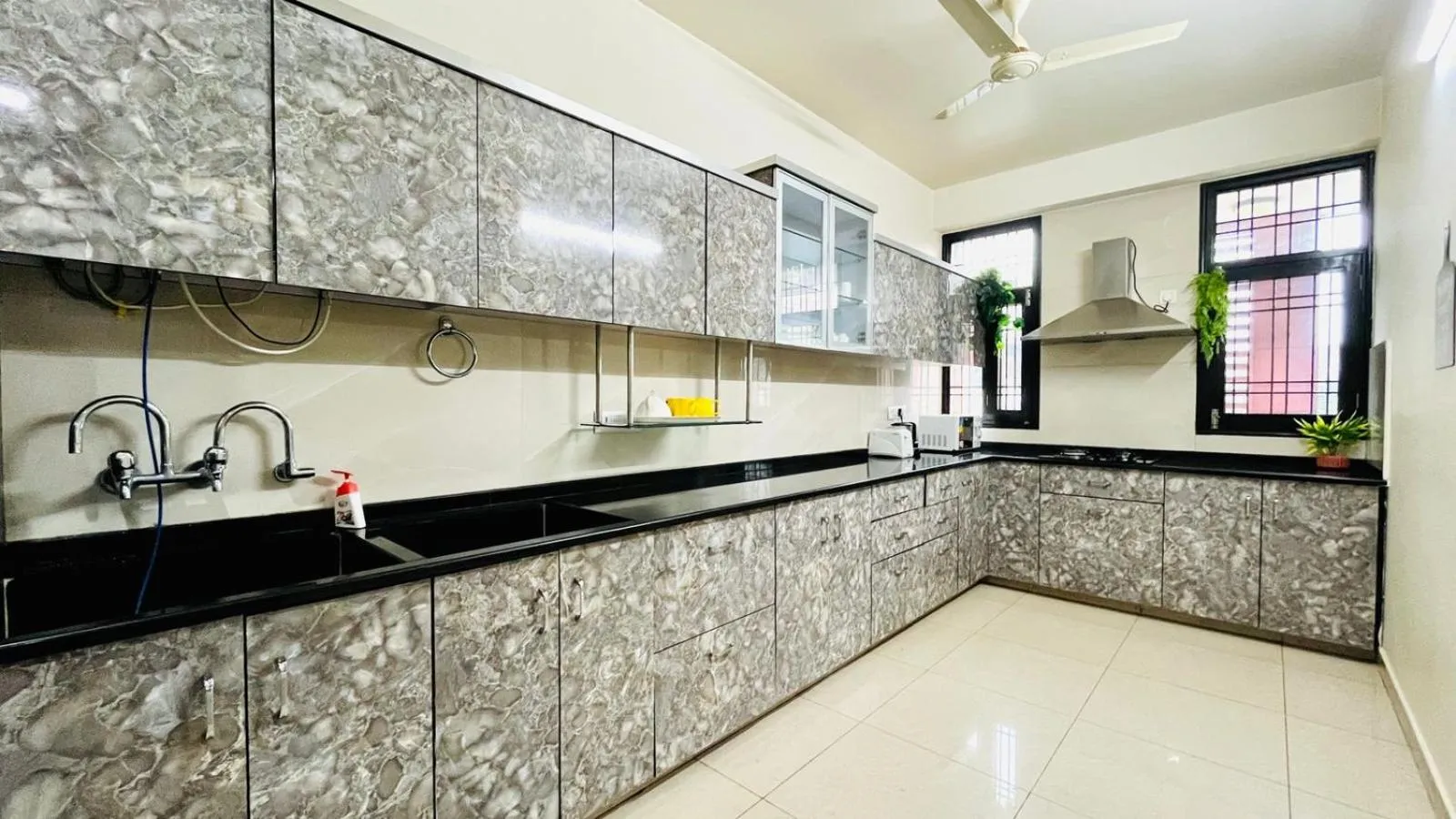 Kitchen or kitchenette in Olive Service Apartments Jaipur - Vaishali Nagar