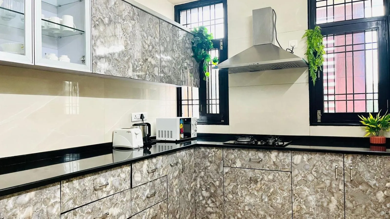 kitchen in Olive Service Apartments Jaipur - Vaishali Nagar