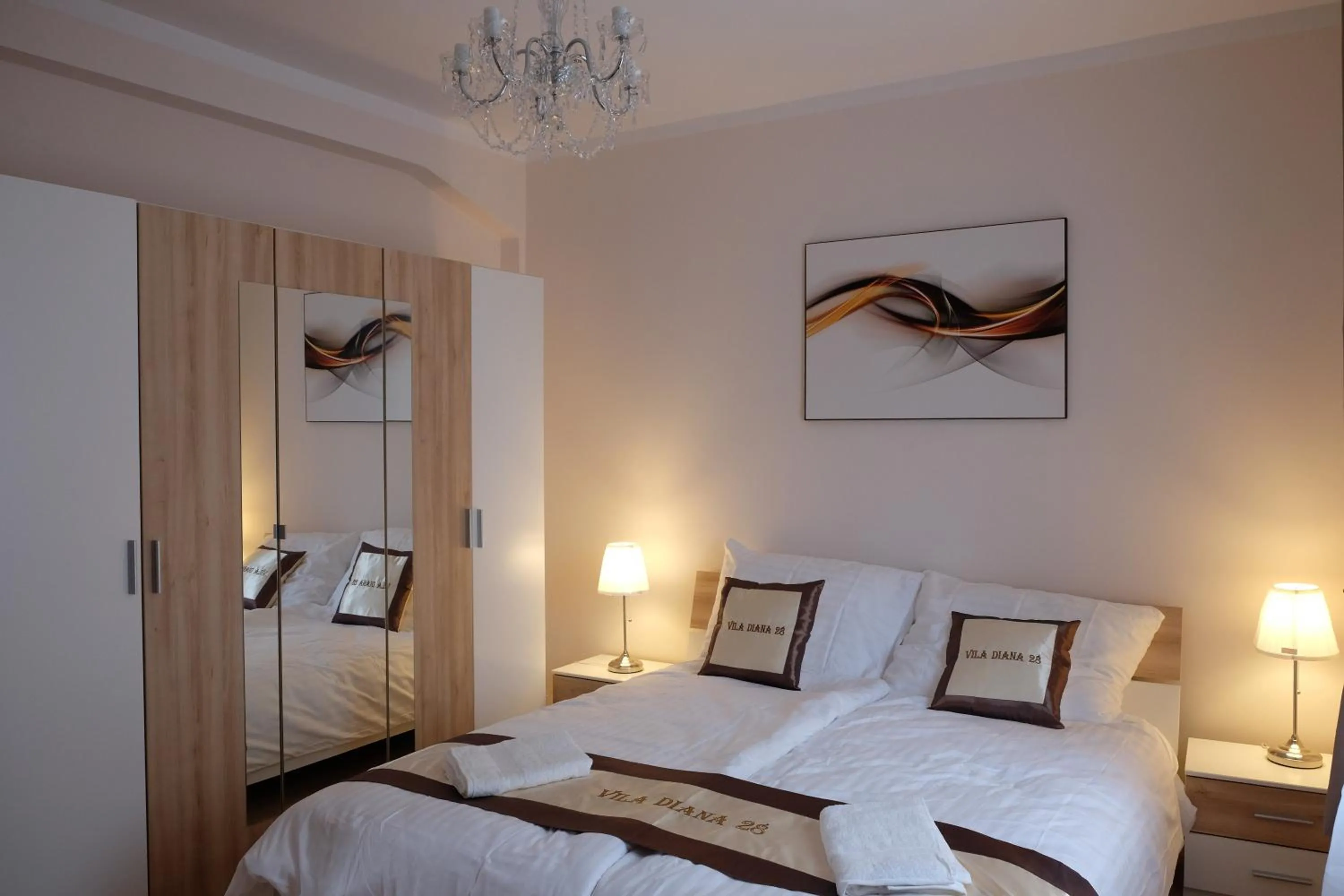 TV and multimedia, Bed in Diana Apartments Karlovy Vary