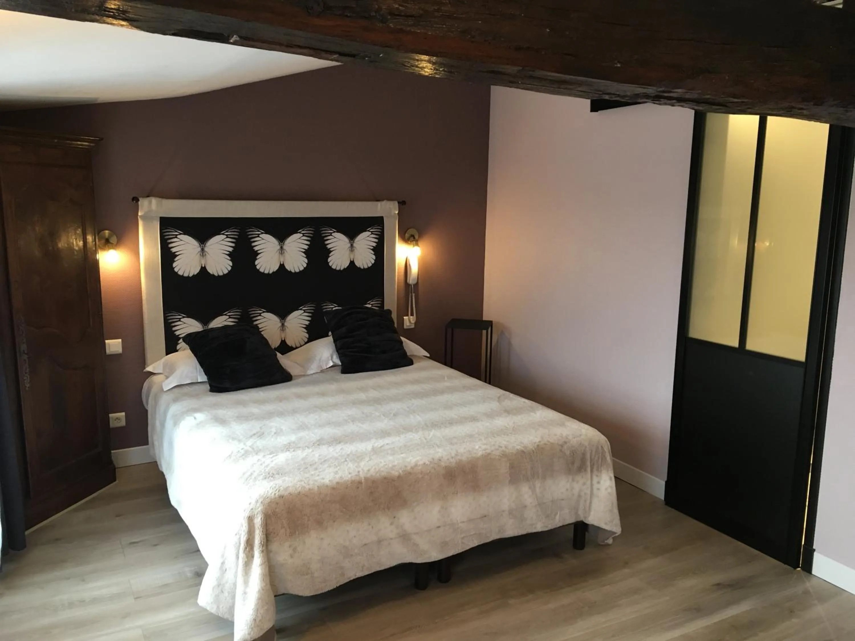 Photo of the whole room, Bed in Logis Hôtel Le Moulin de Chalons