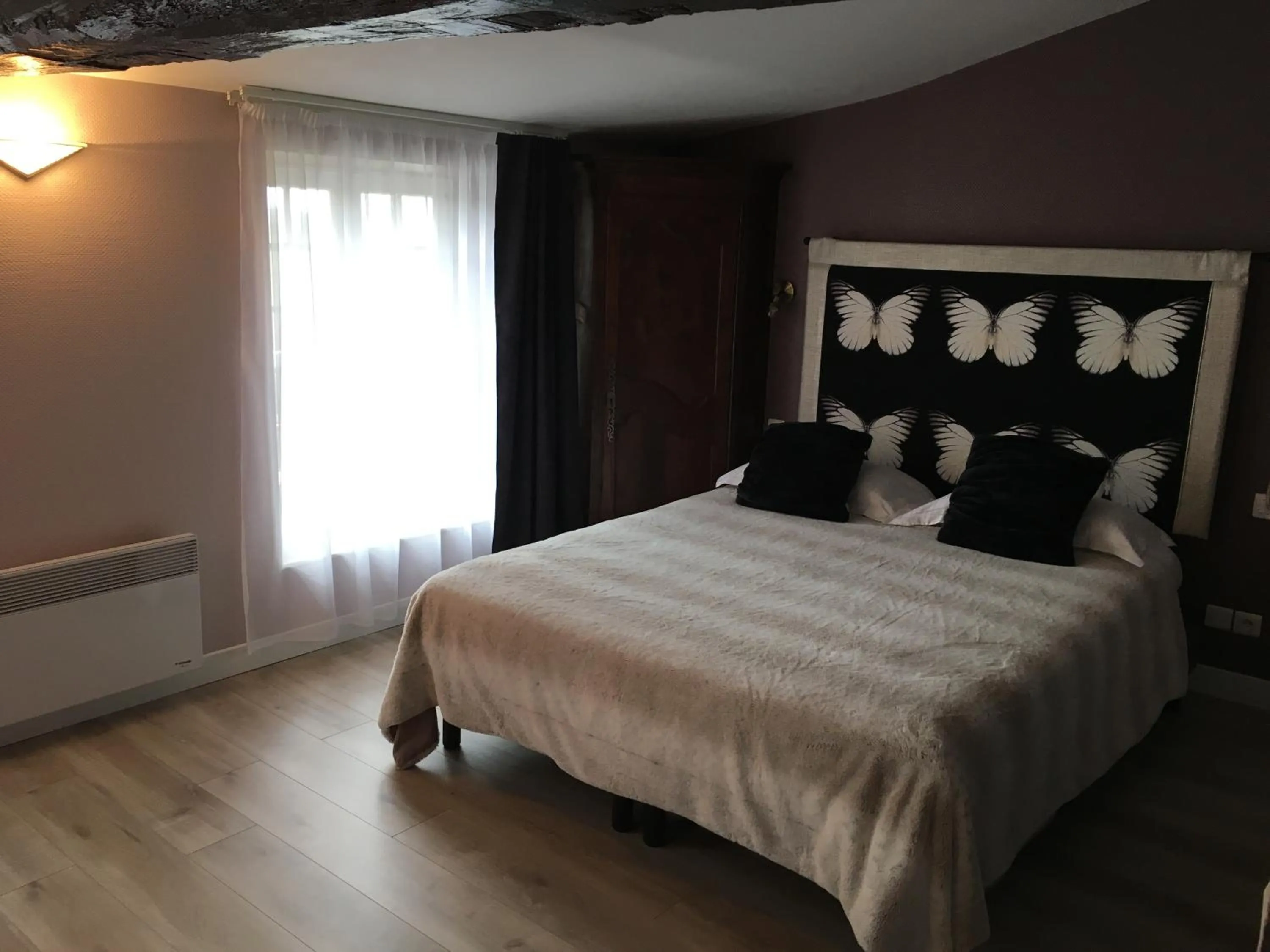Photo of the whole room, Bed in Logis Hôtel Le Moulin de Chalons