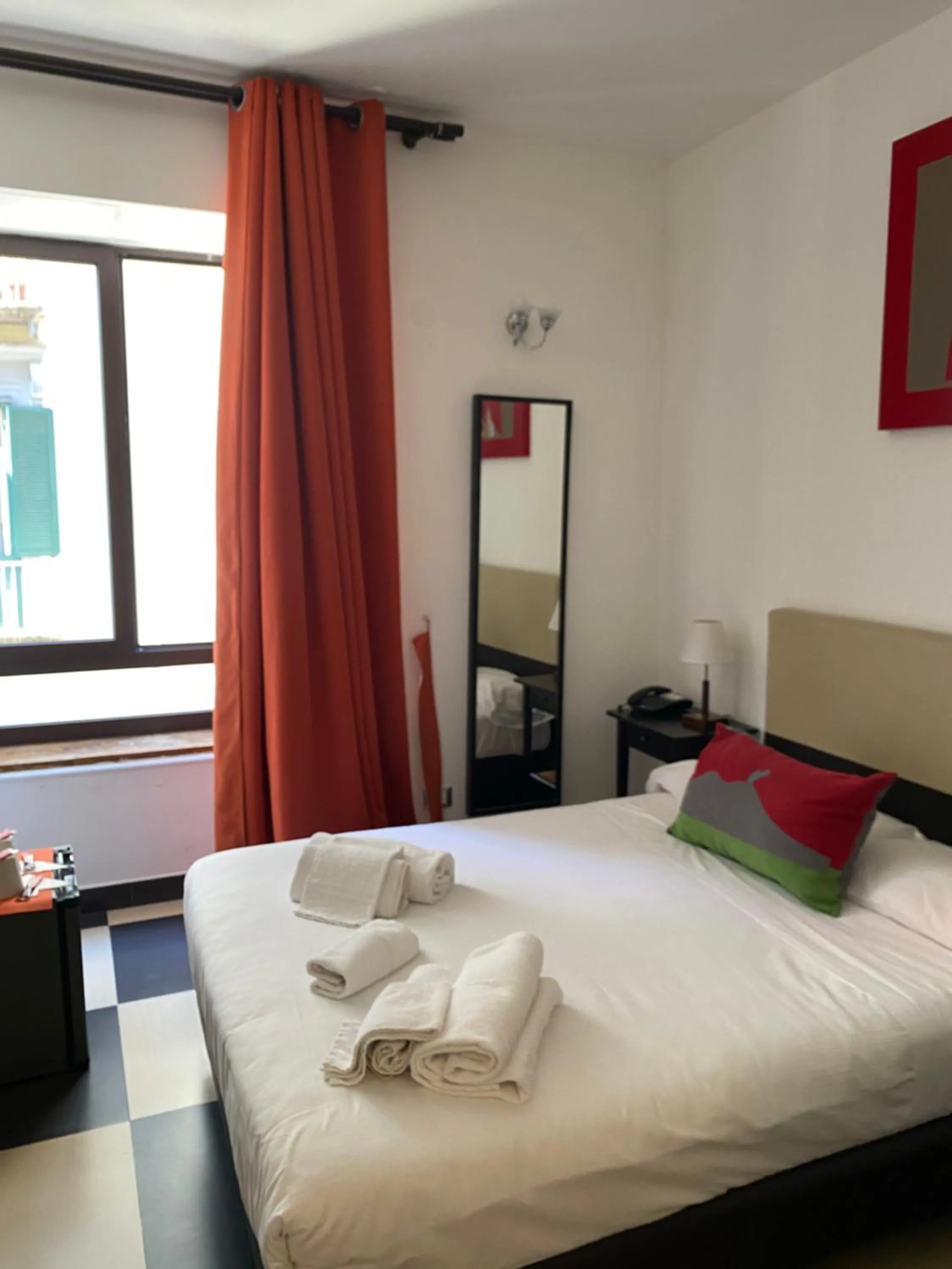 Bed in Hotel Plebiscito Aparthotel