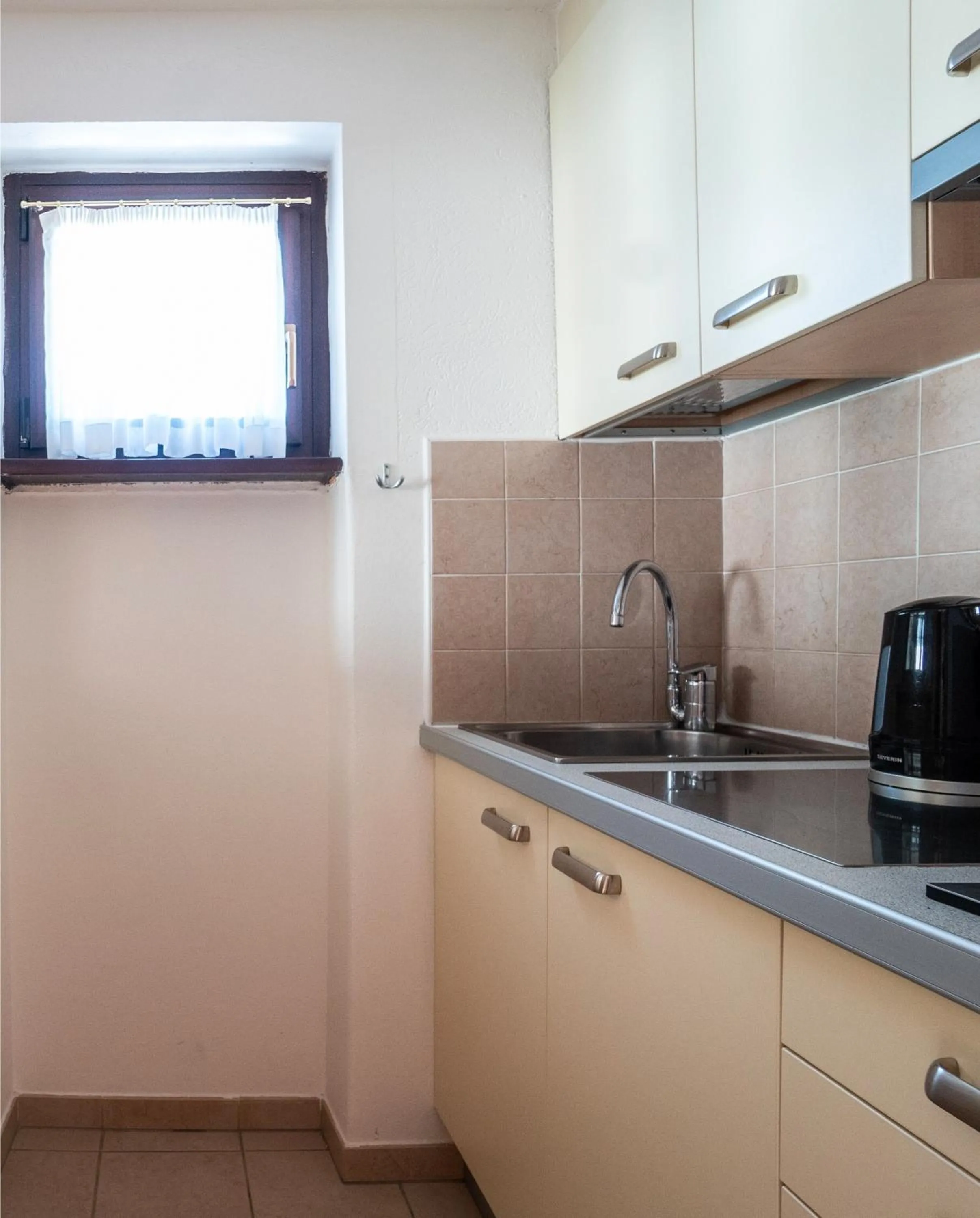 Kitchen or kitchenette in Residence Lastei