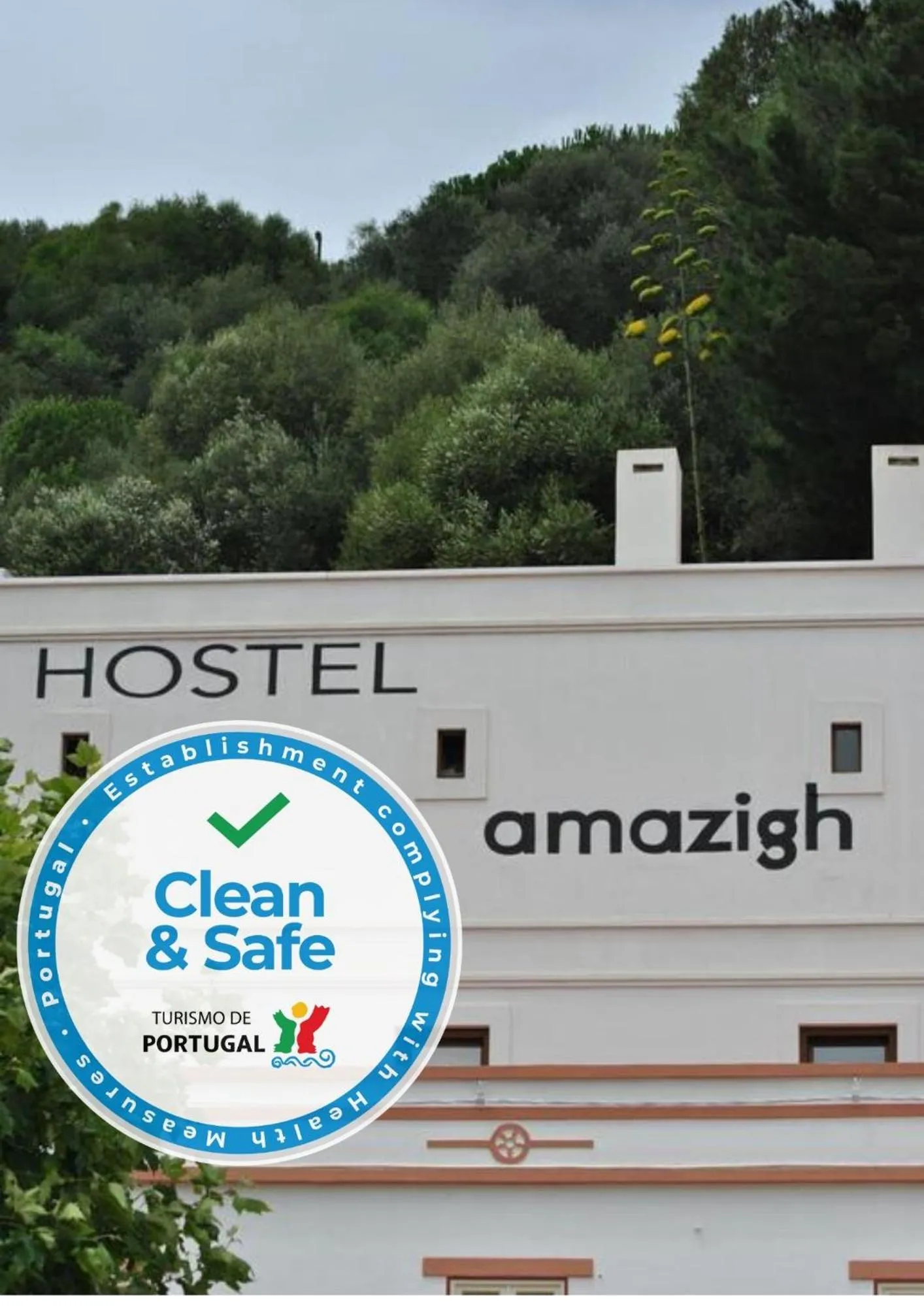 Property logo or sign in AMAZIGH HOSTEL ensuite Rooms & Dorms with self-catering Kitchen