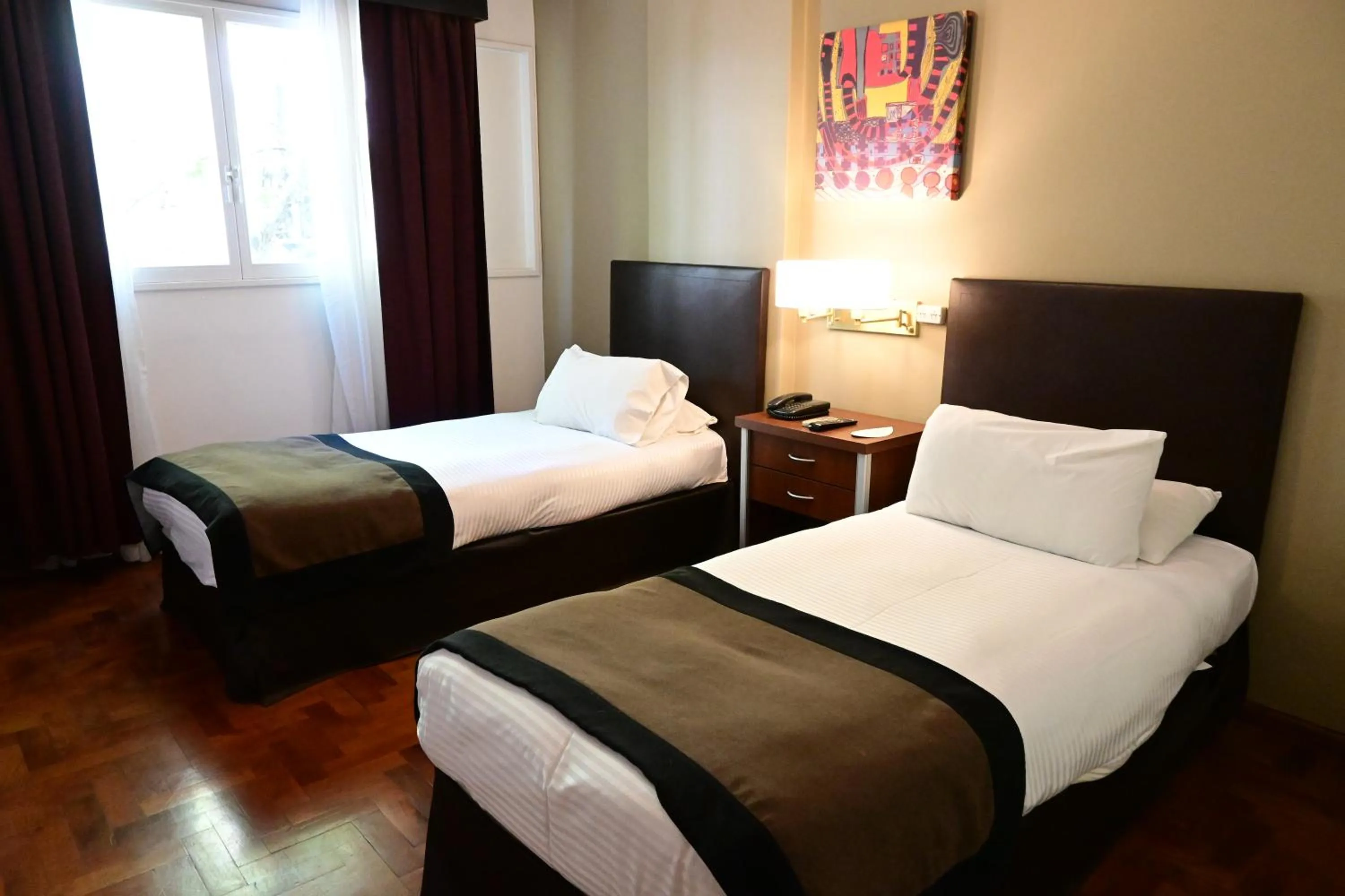 Bed in Hotel Mendoza