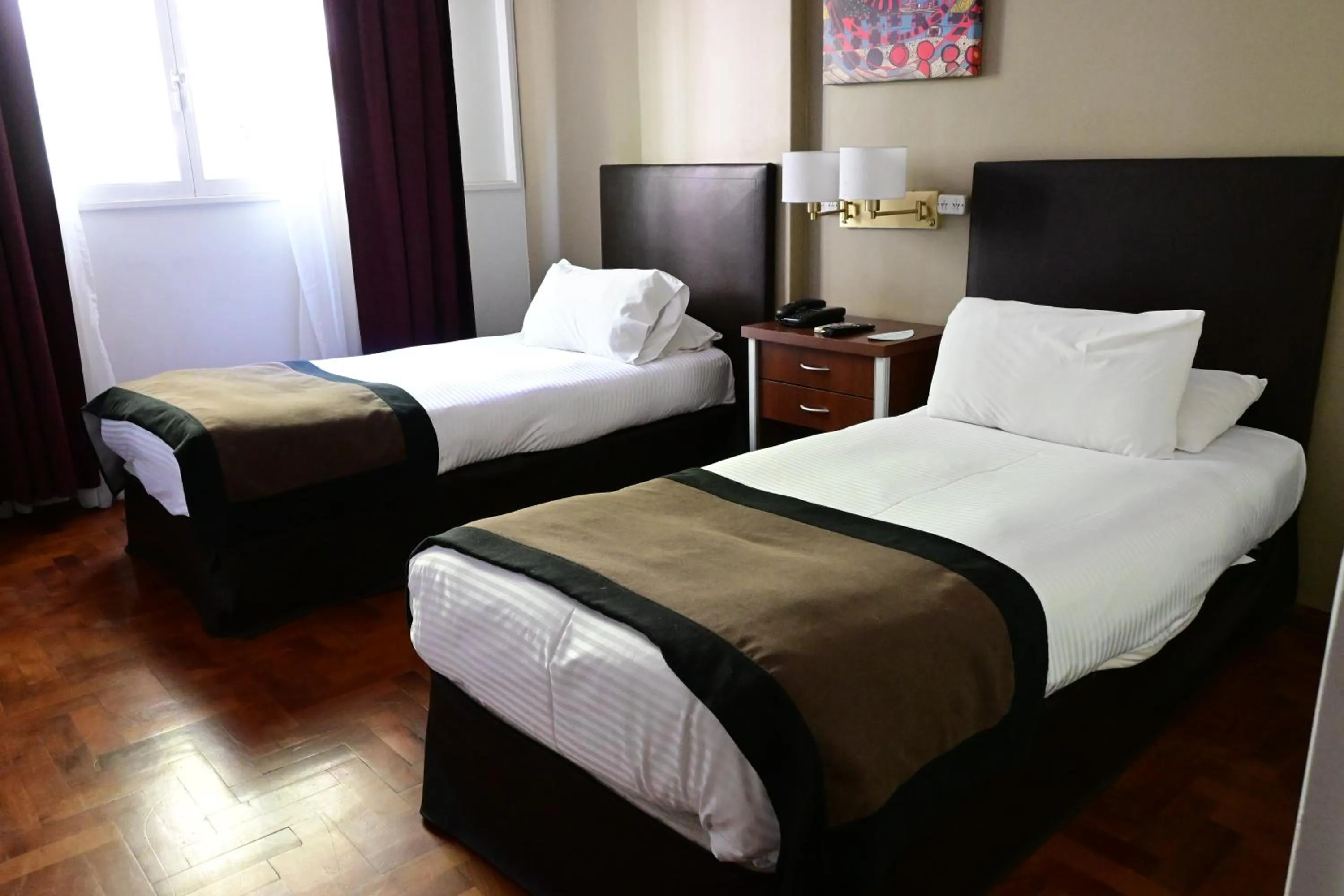 Bed in Hotel Mendoza