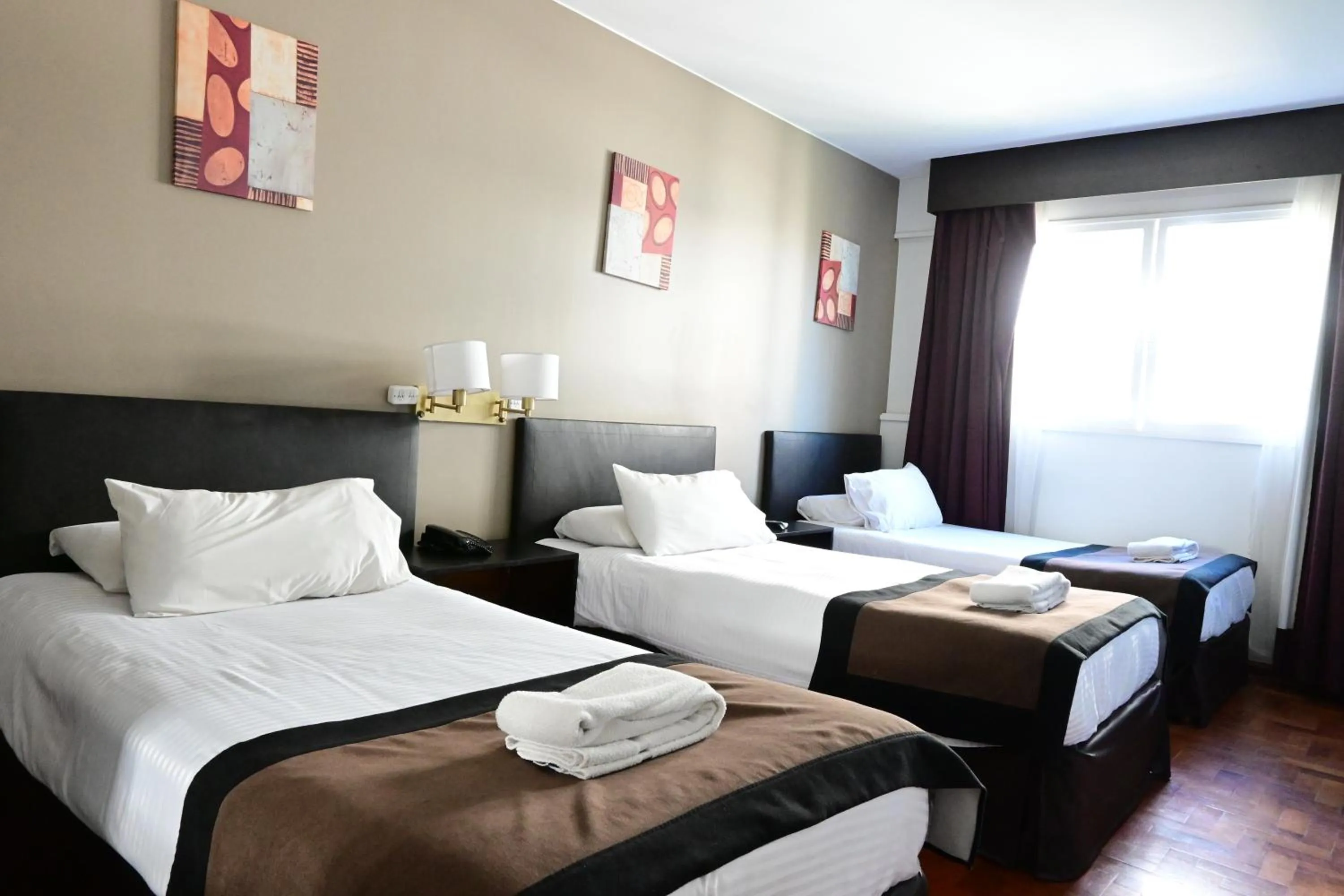 Bed in Hotel Mendoza