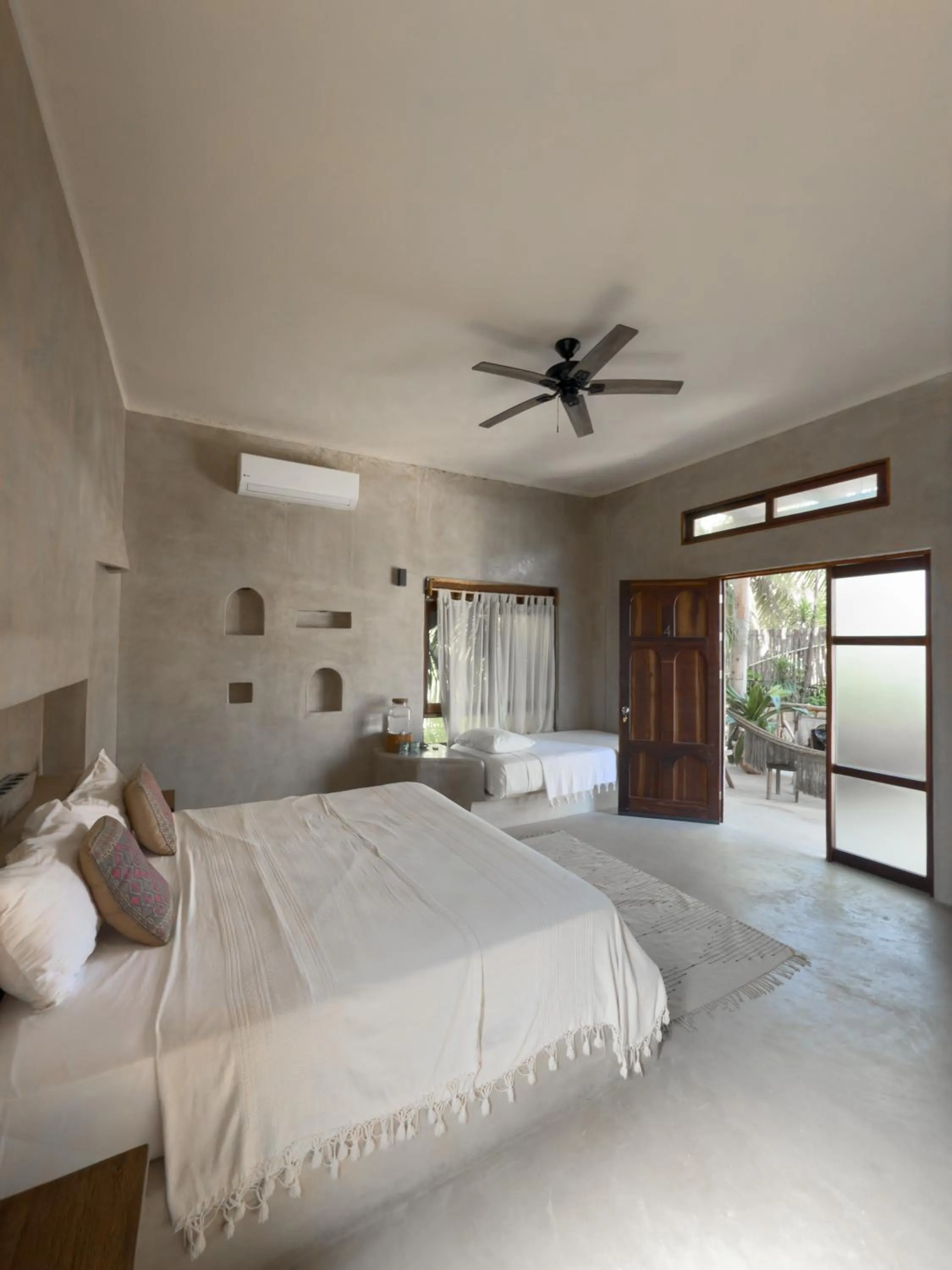 Bed in La Posada del Sol Boutique Hotel Tulum