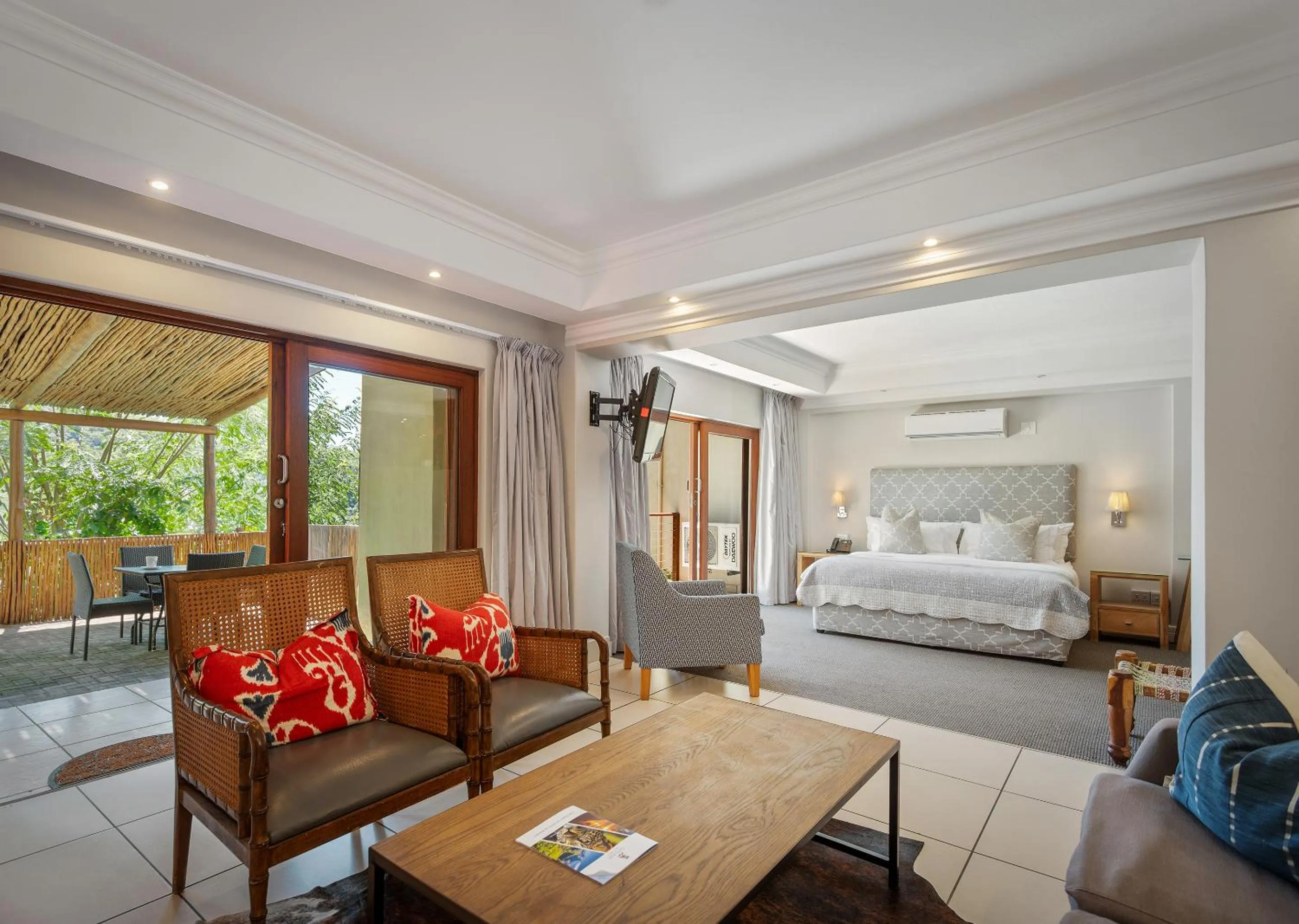 Patio, Bed in Jozini Tiger Lodge & Spa by Dream Resorts