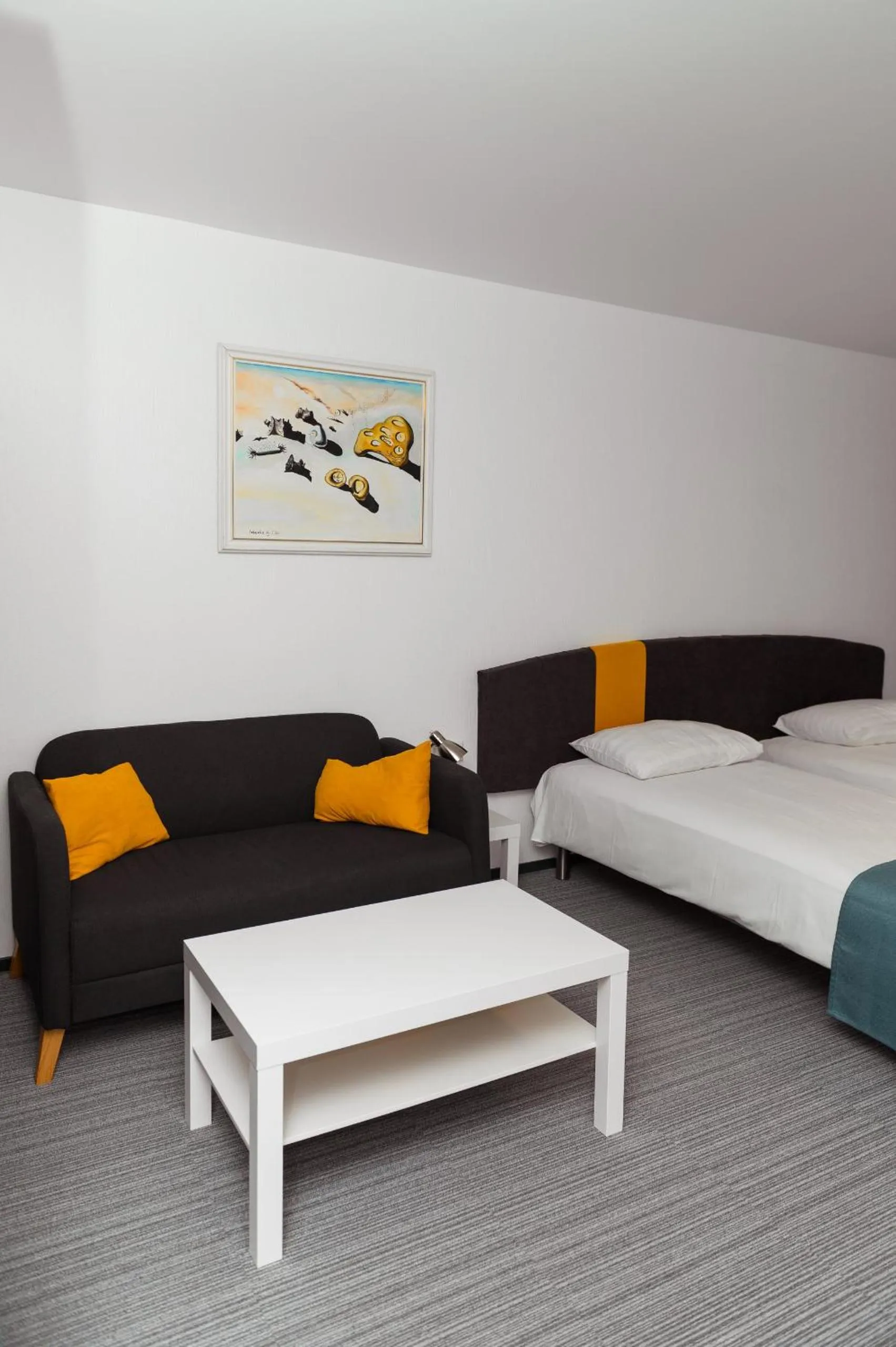 Seating area, Bed in Inger Hotell