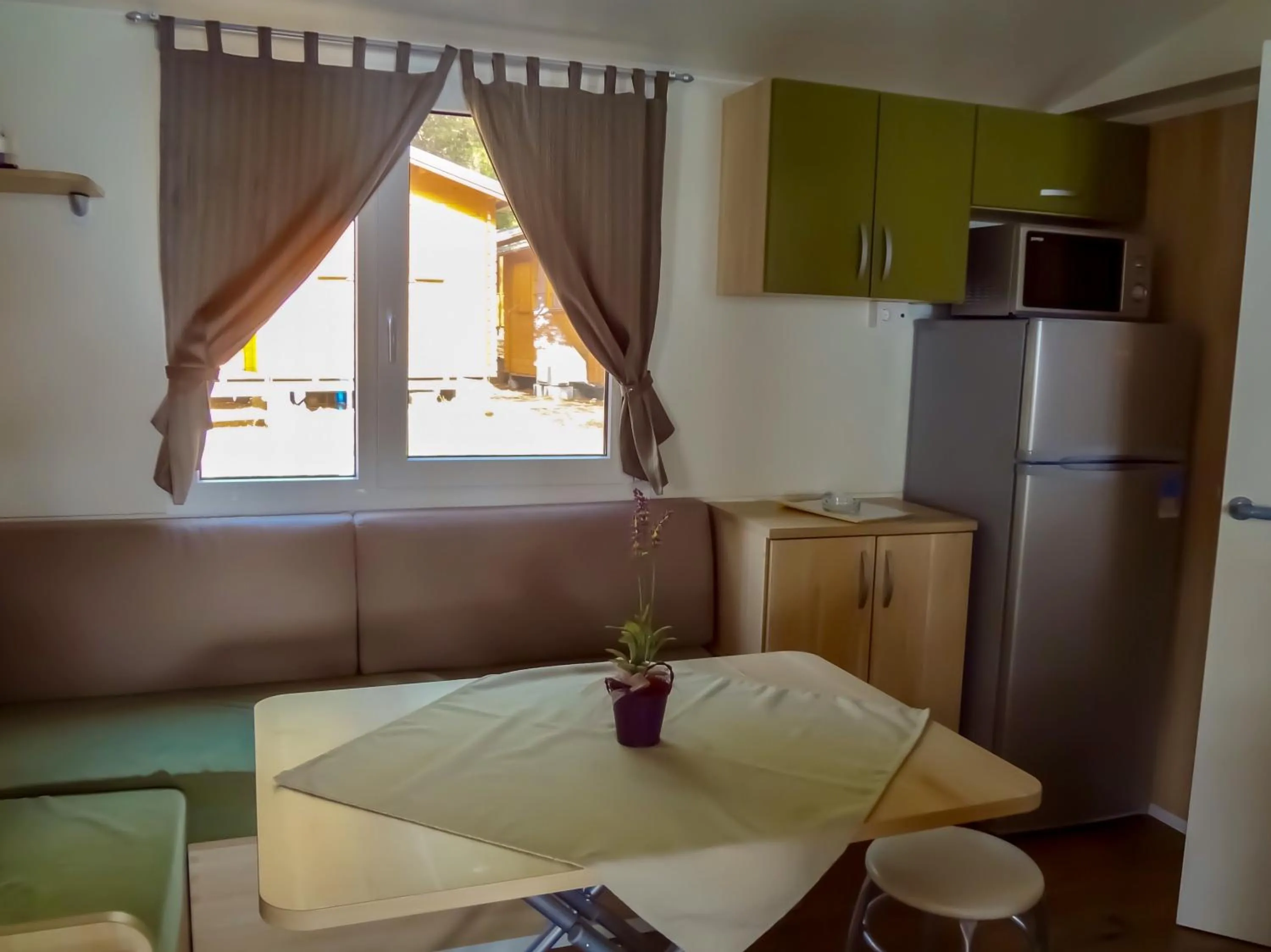 Living room in Victoria Mobilhome Camping Dole-Živogošče