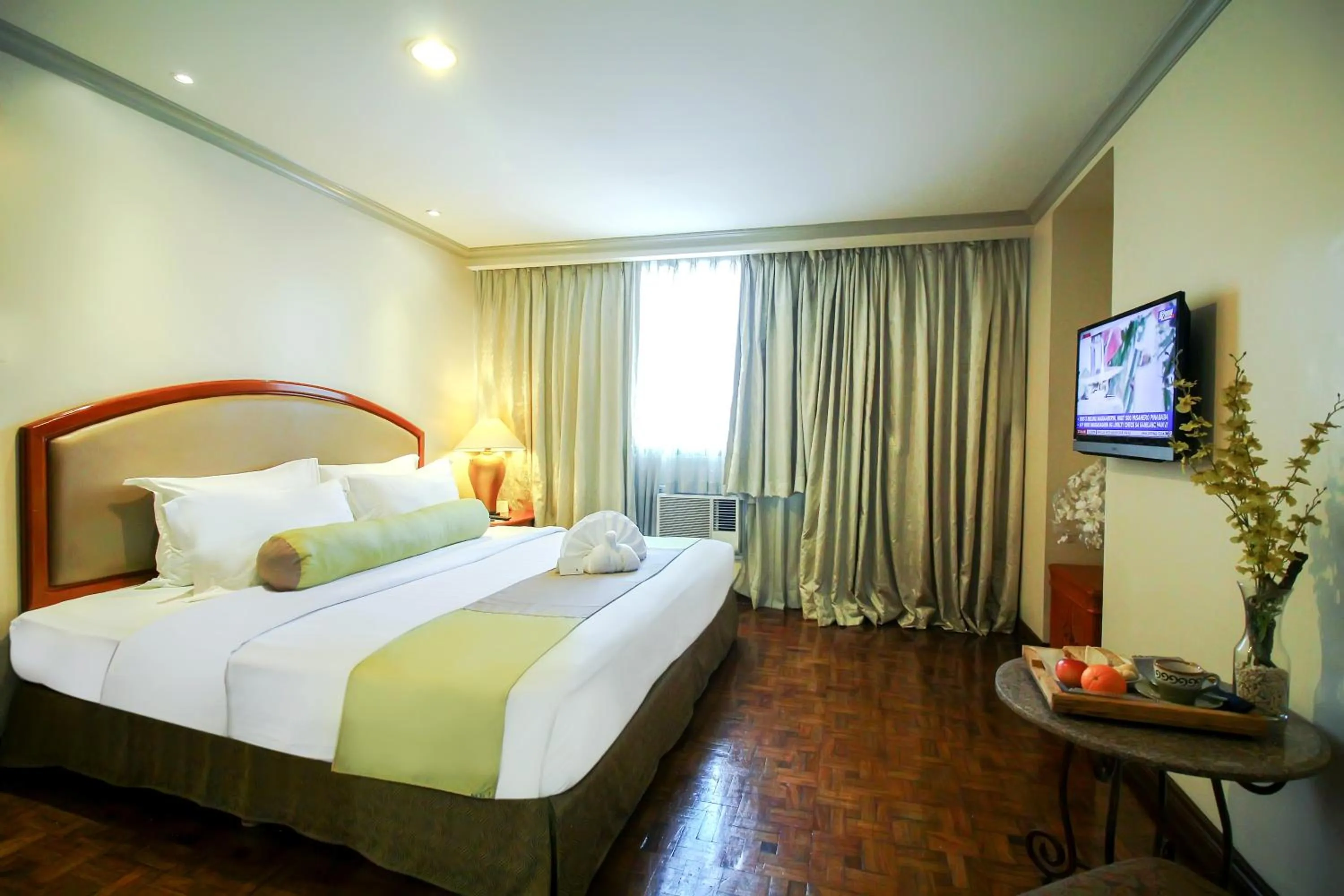 Bed in Makati Palace Hotel