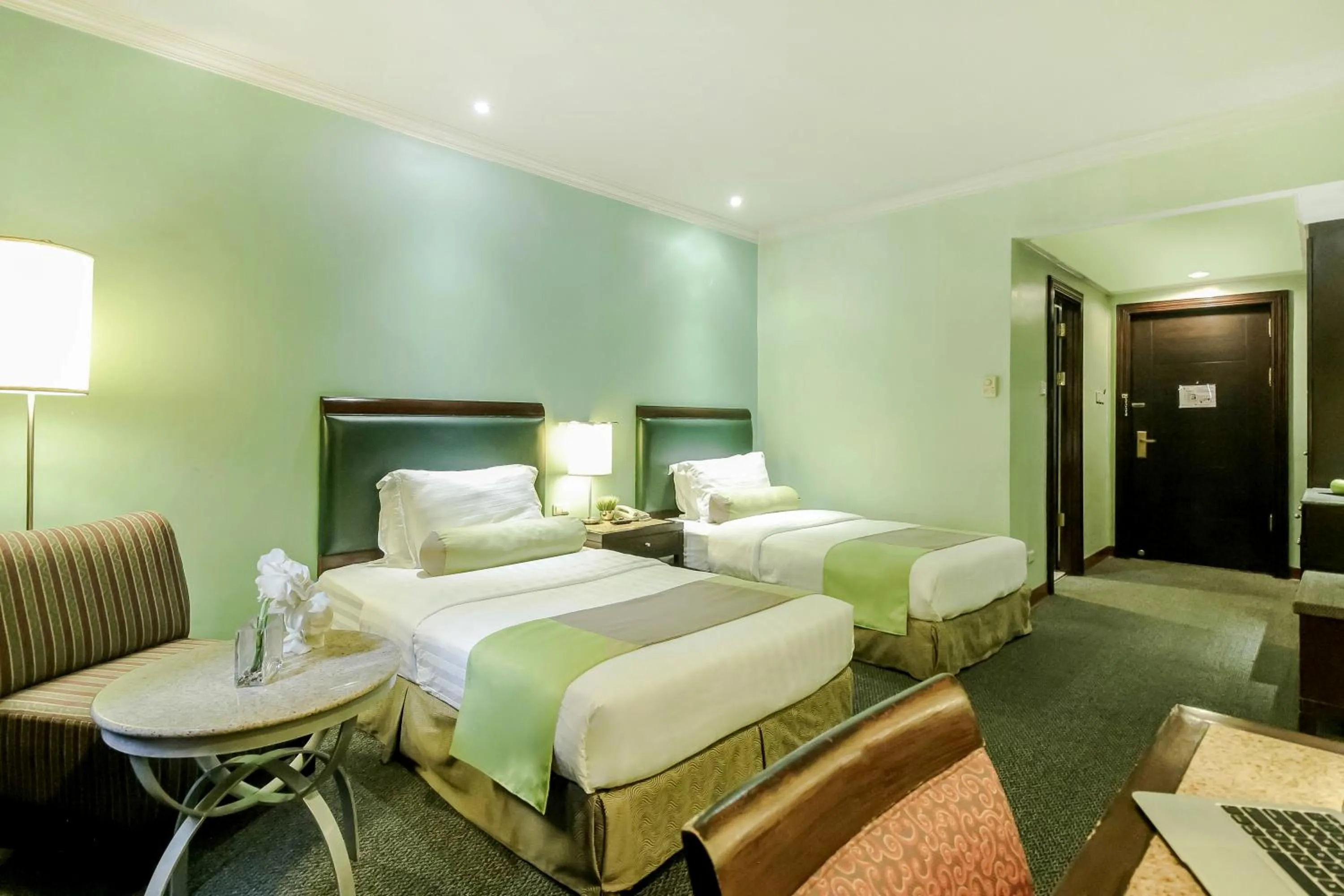 Bed in Makati Palace Hotel