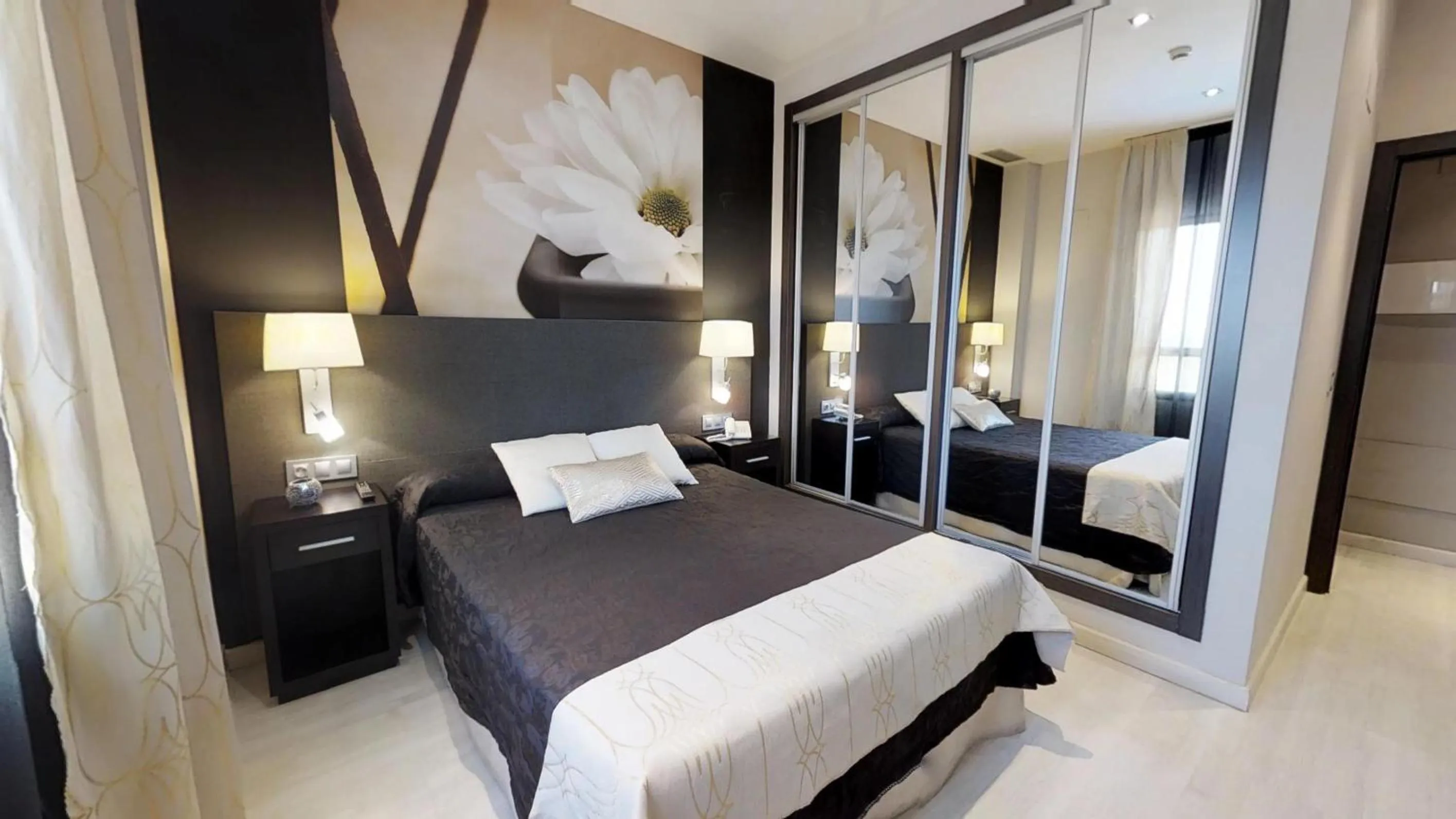 Bed in Leo Deluxe Punta Umbría