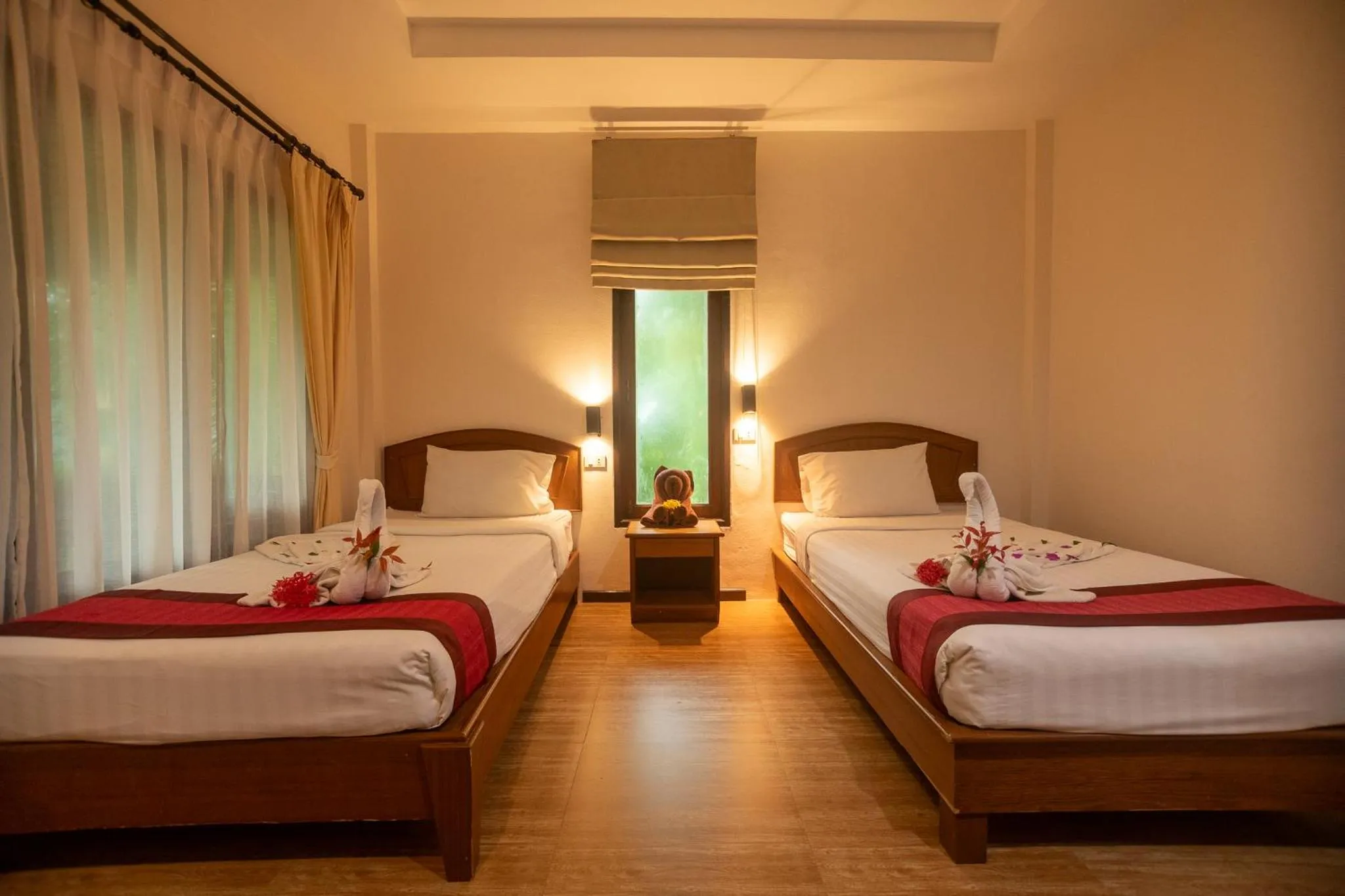 Bed in The Vatika Resort and Spa