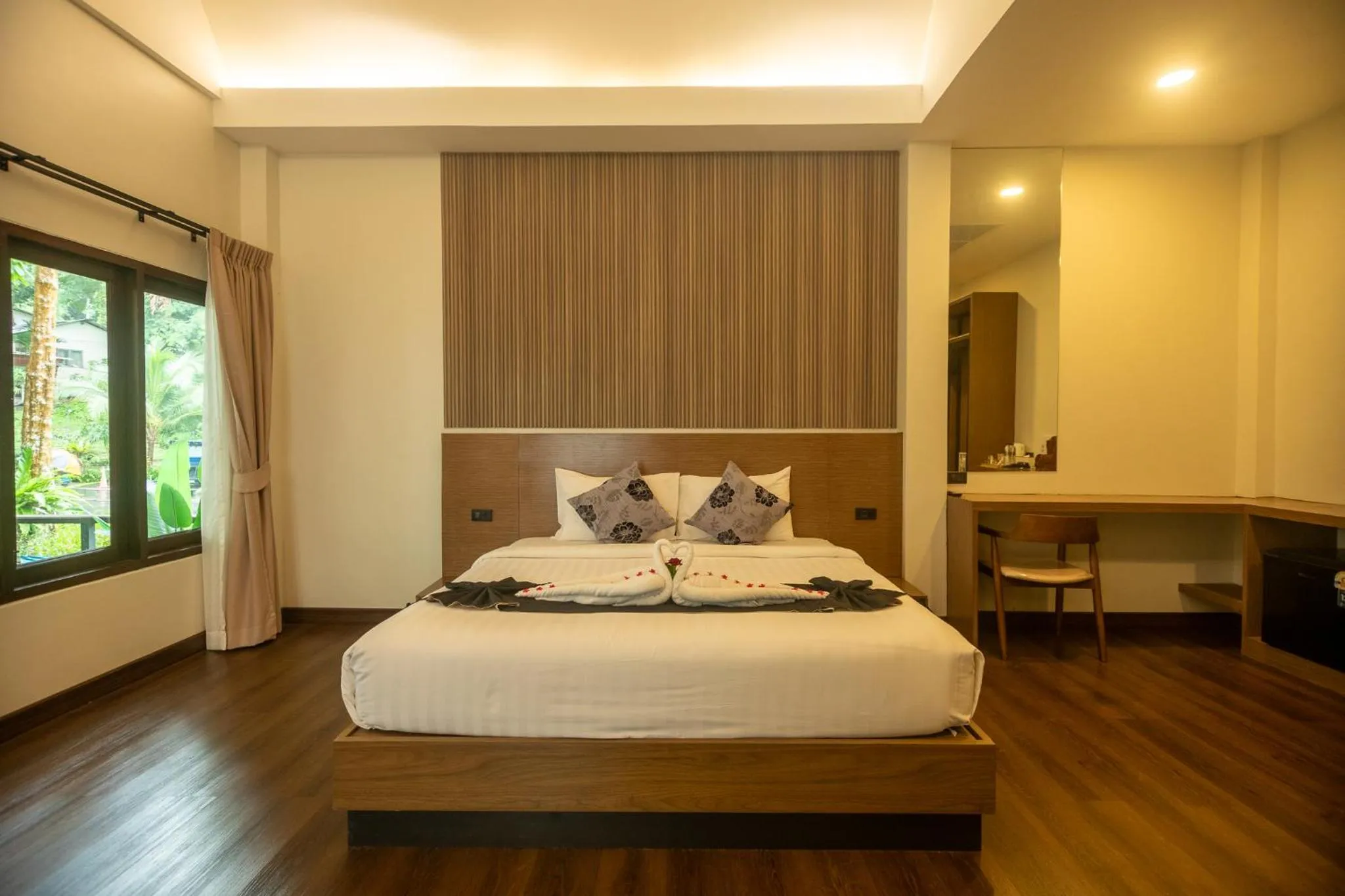 Bed in The Vatika Resort and Spa