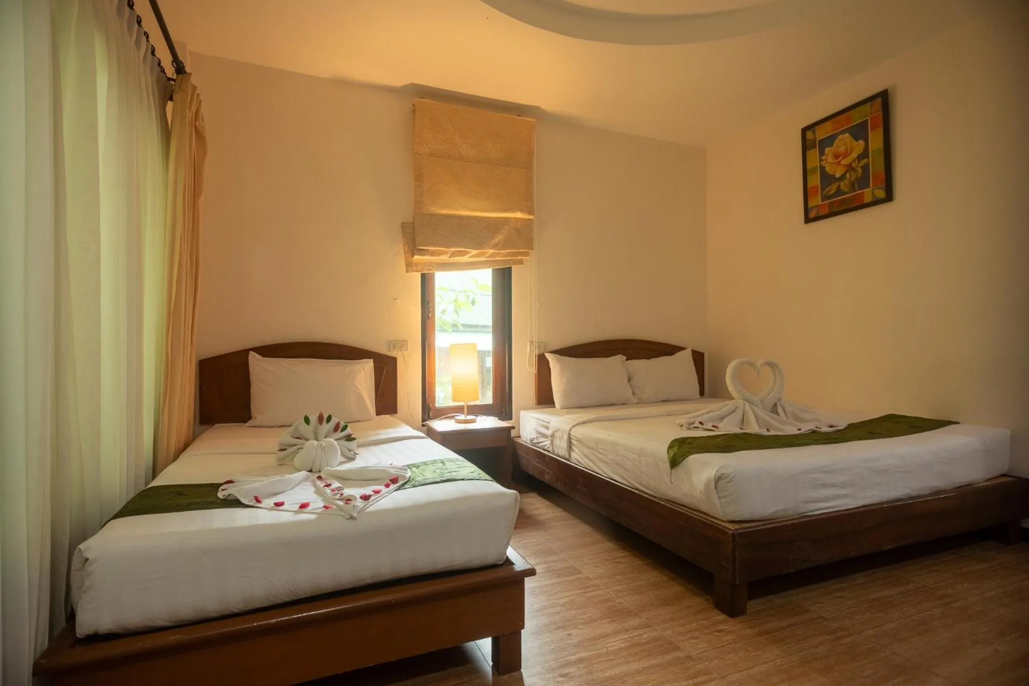 Bed in The Vatika Resort and Spa