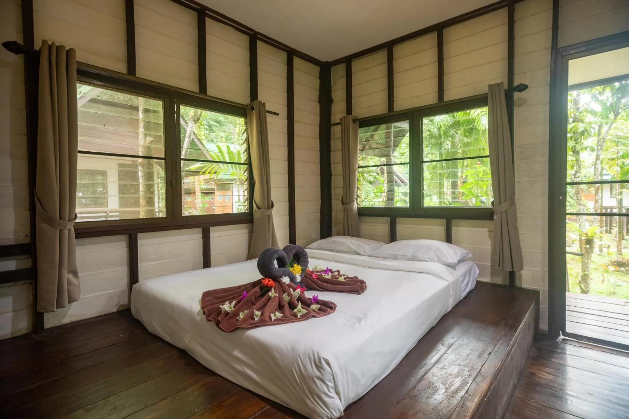 Bed in The Vatika Resort and Spa