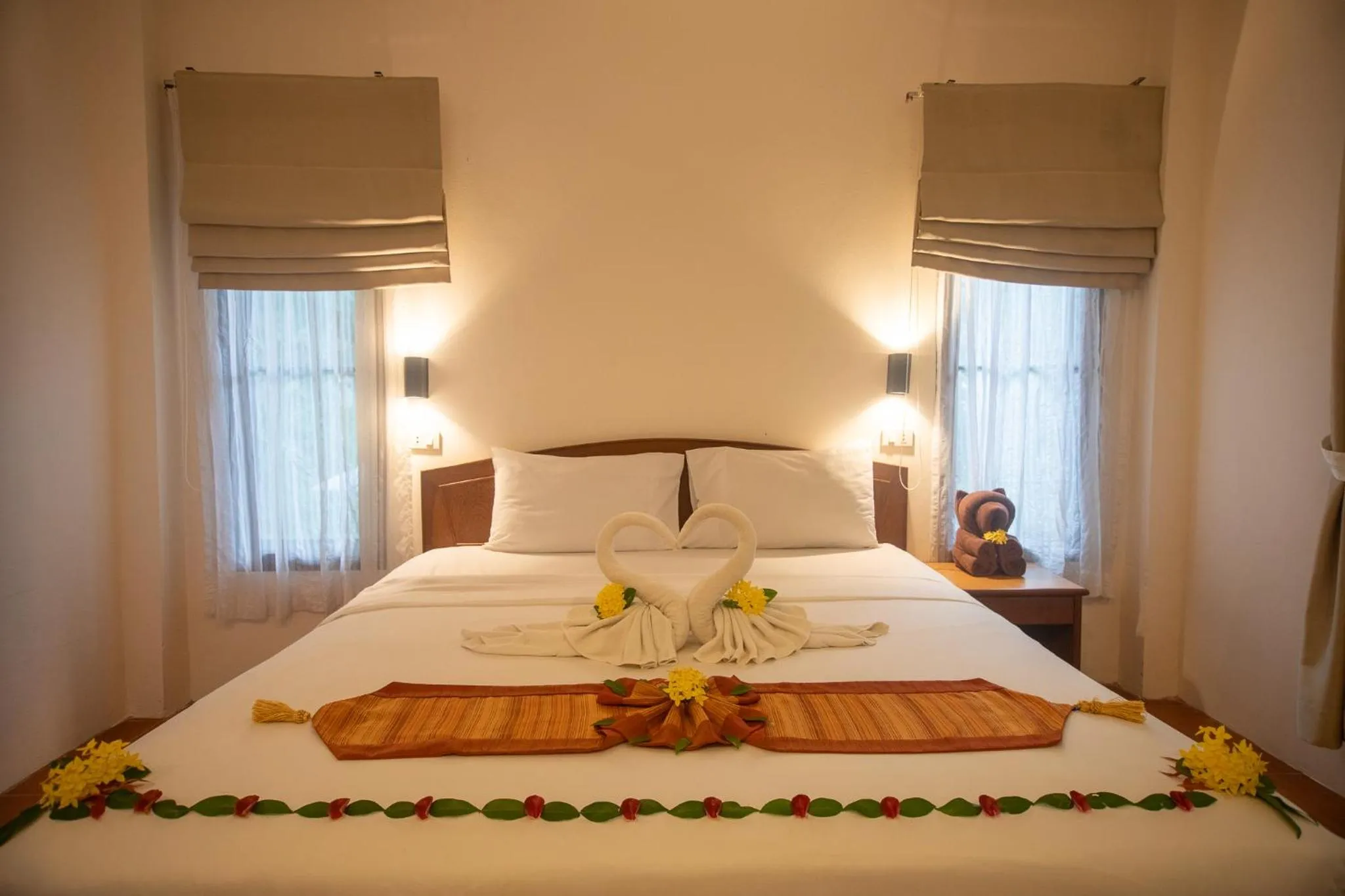 Bed in The Vatika Resort and Spa