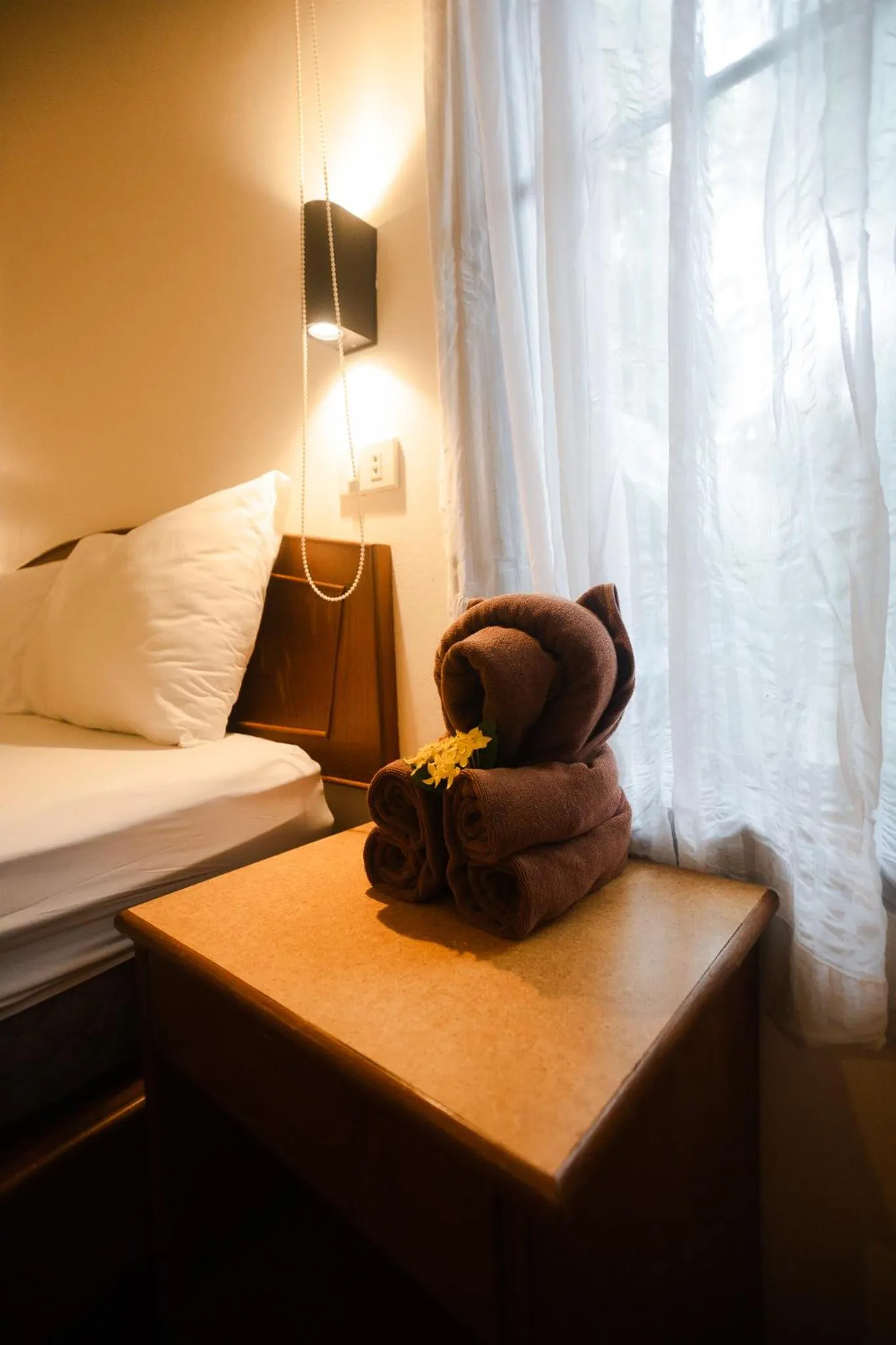 Bed in The Vatika Resort and Spa