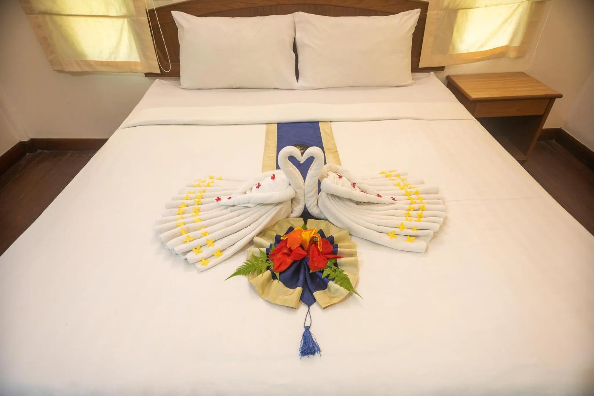 Bed in The Vatika Resort and Spa