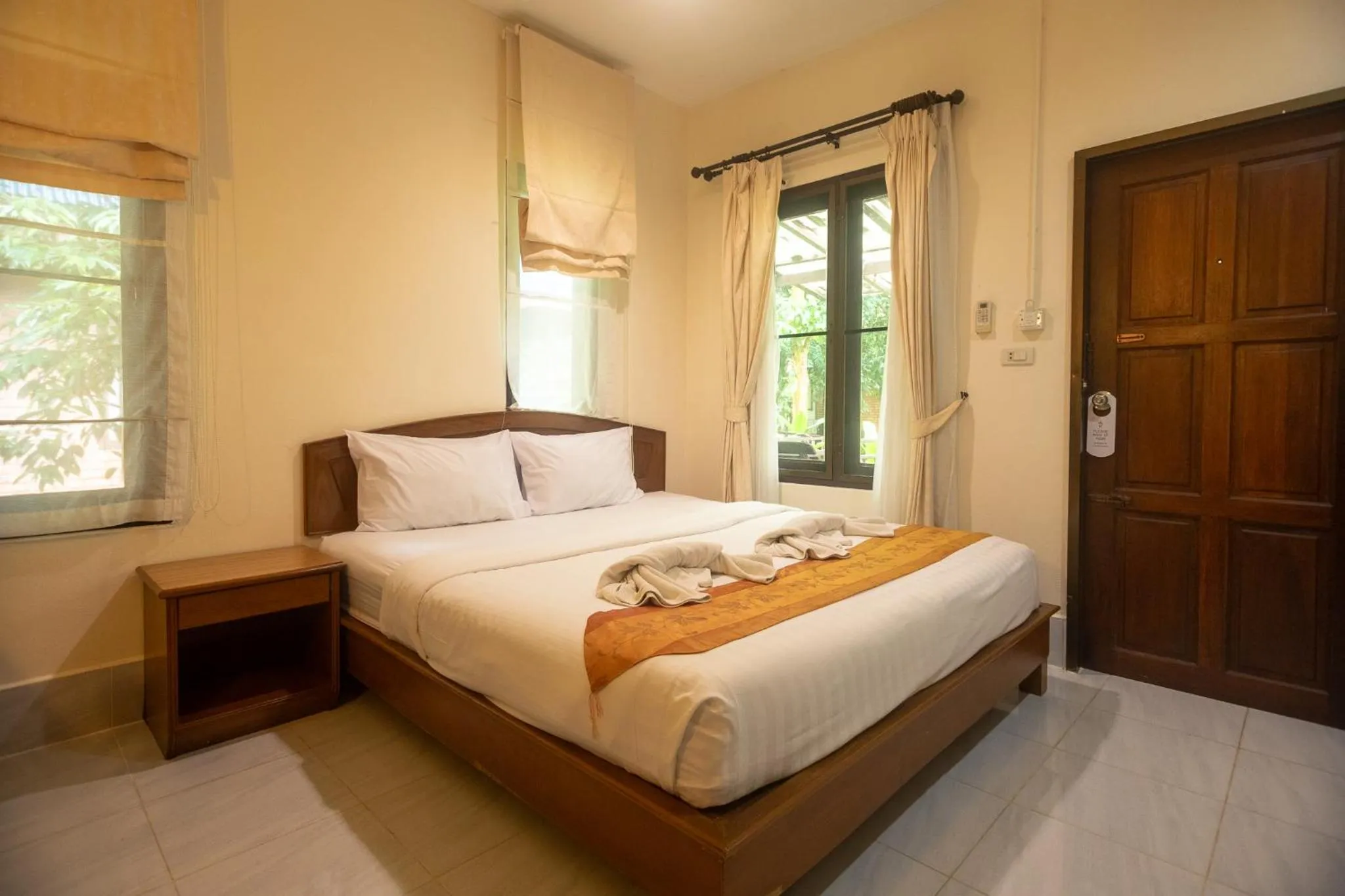 Bed in The Vatika Resort and Spa