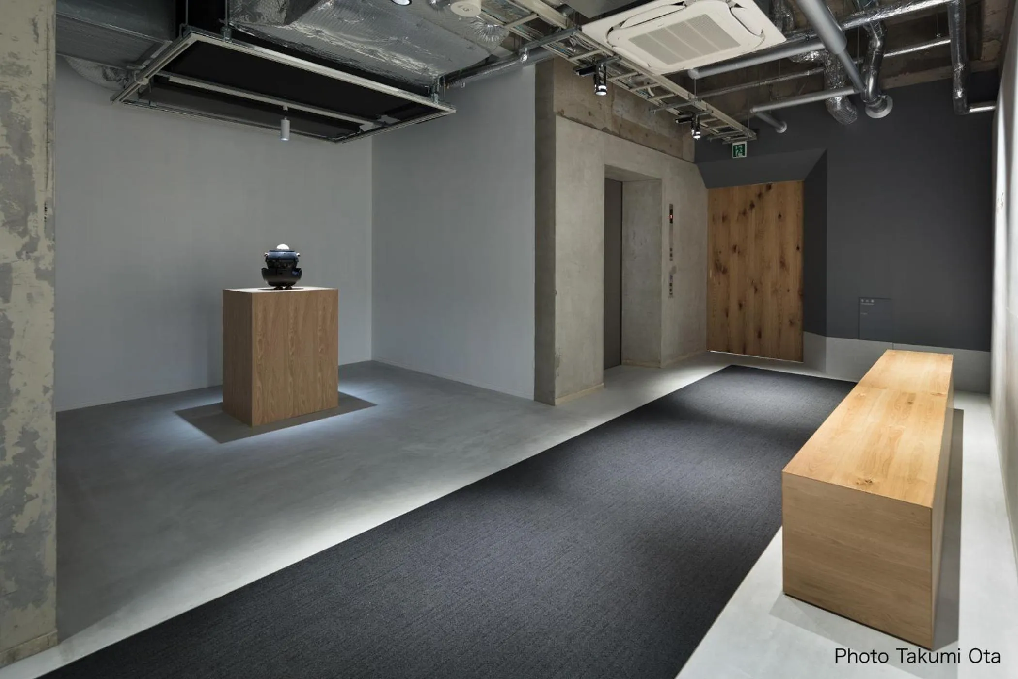 Communal lounge/ TV room in KUMU Kanazawa by THE SHARE HOTELS