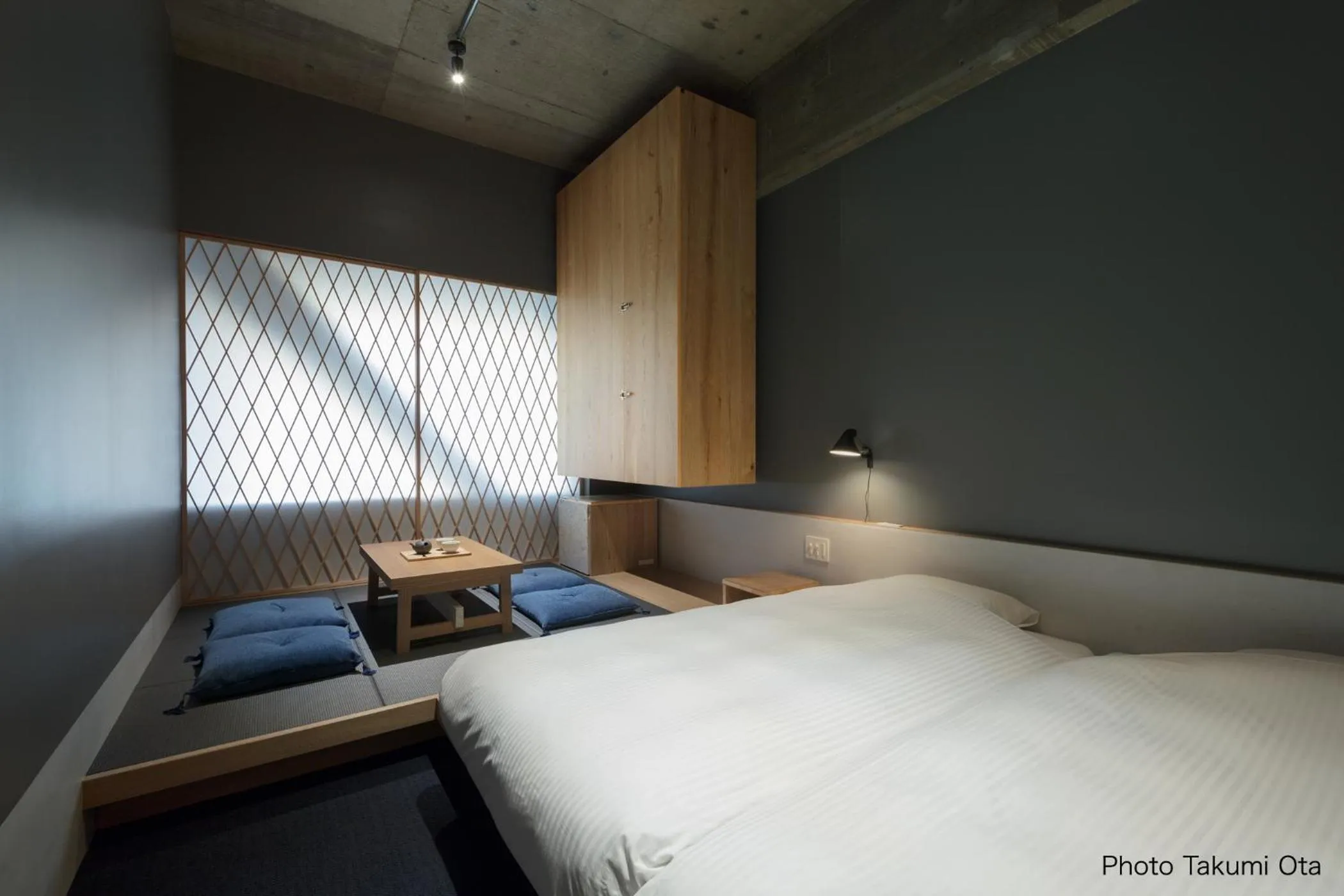 Bed in KUMU Kanazawa by THE SHARE HOTELS