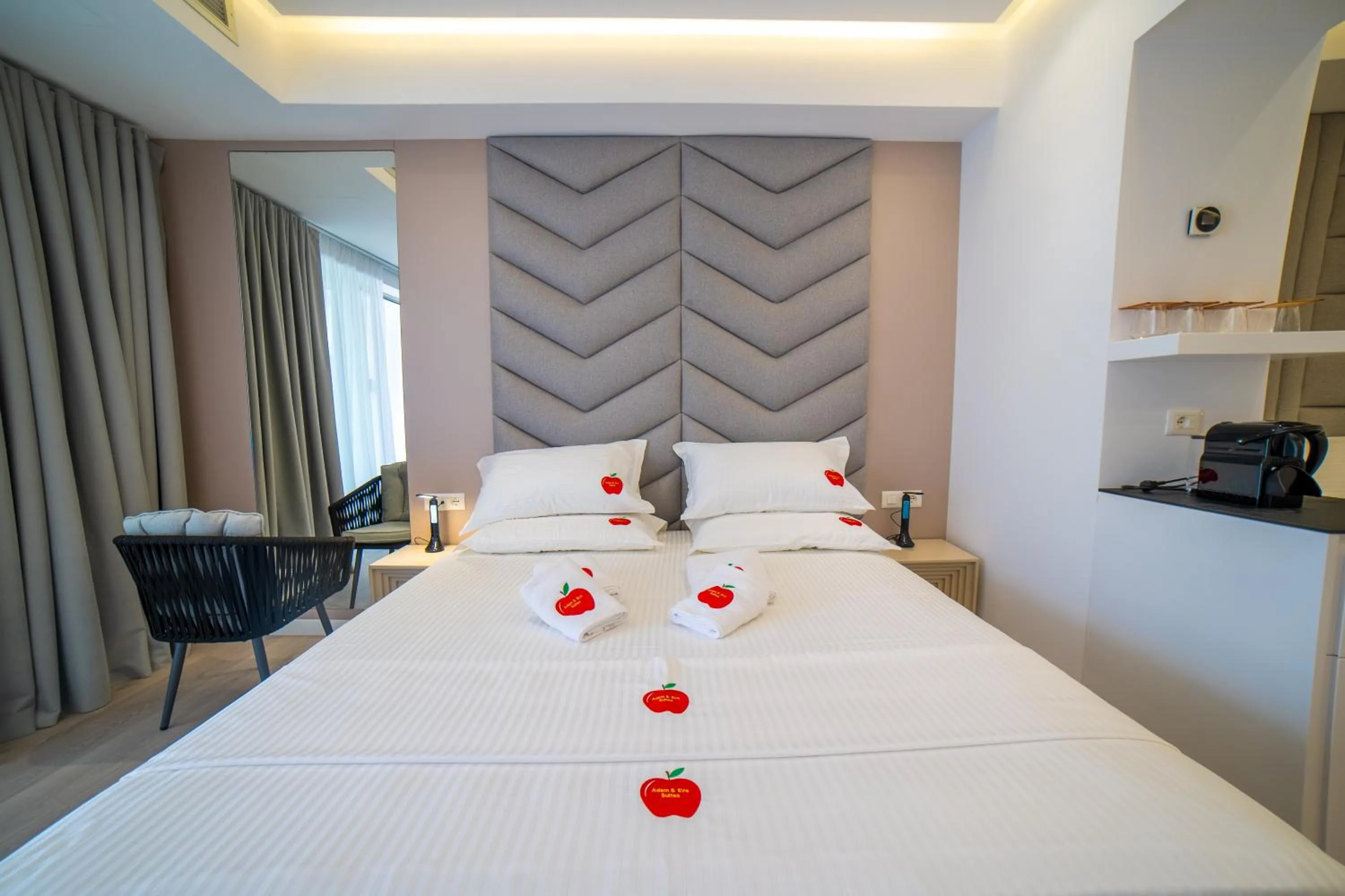 Bed in Adam & Eve Suites
