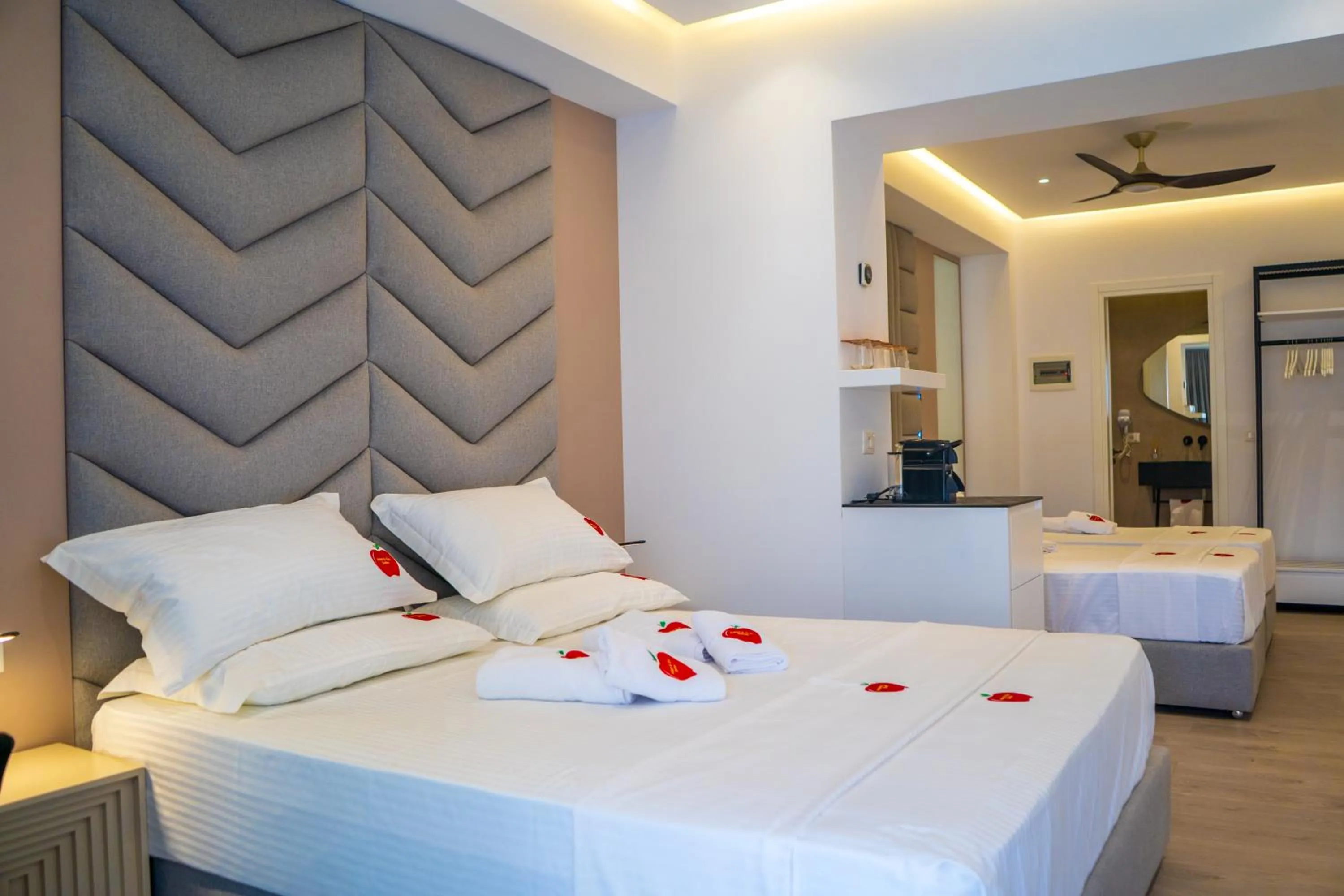 Bed in Adam & Eve Suites