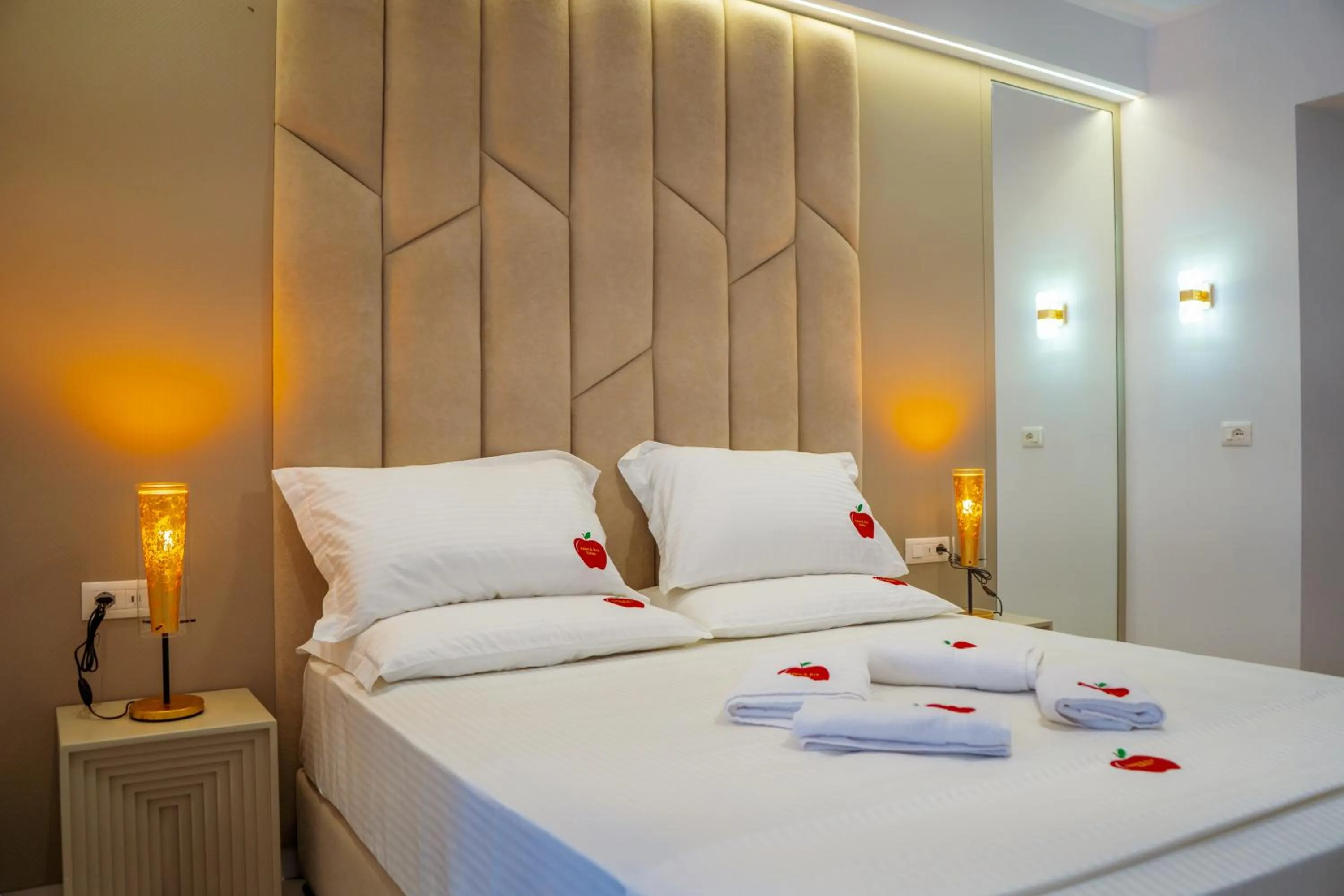 Bed in Adam & Eve Suites