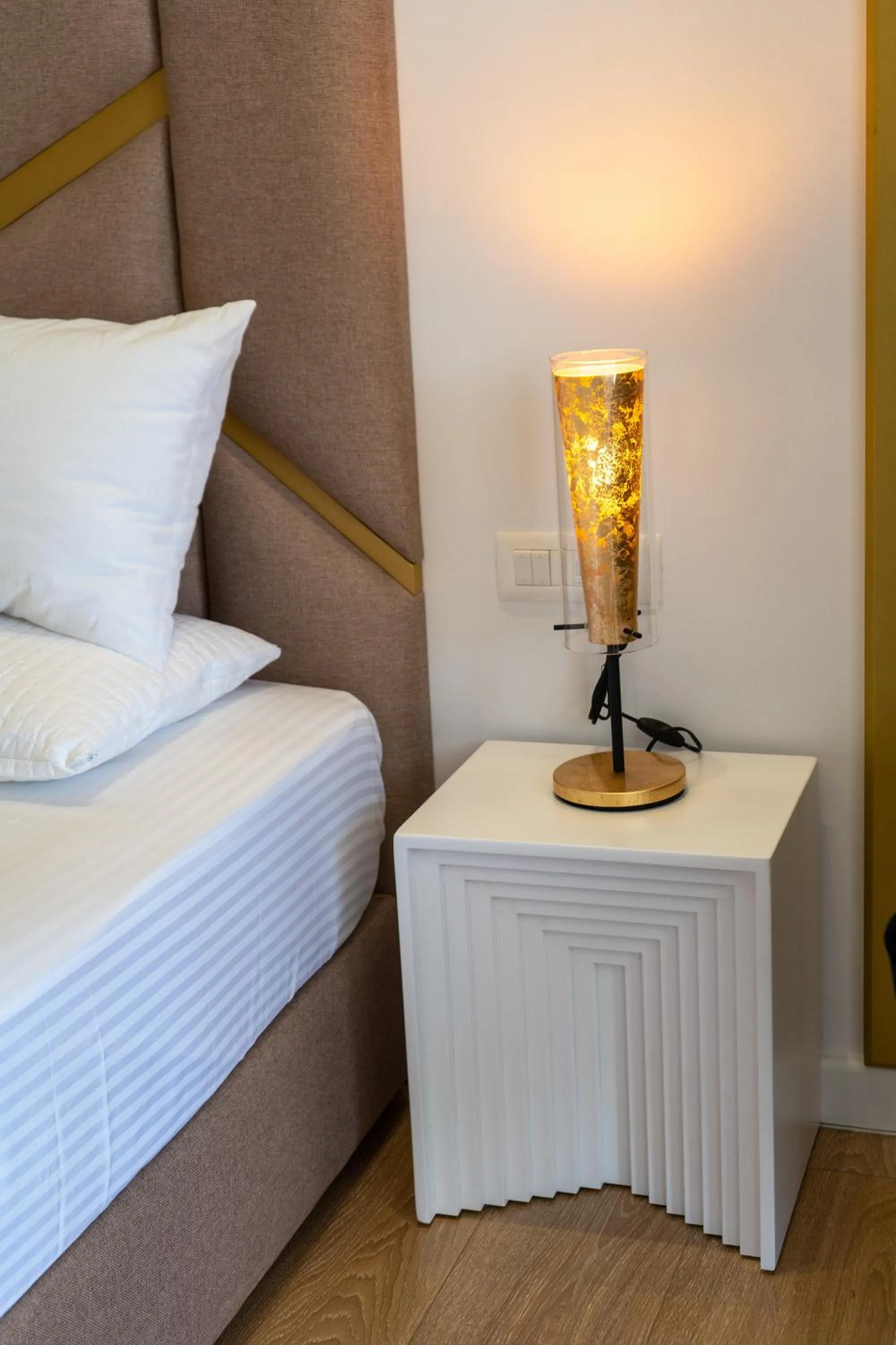 Bed in Adam & Eve Suites