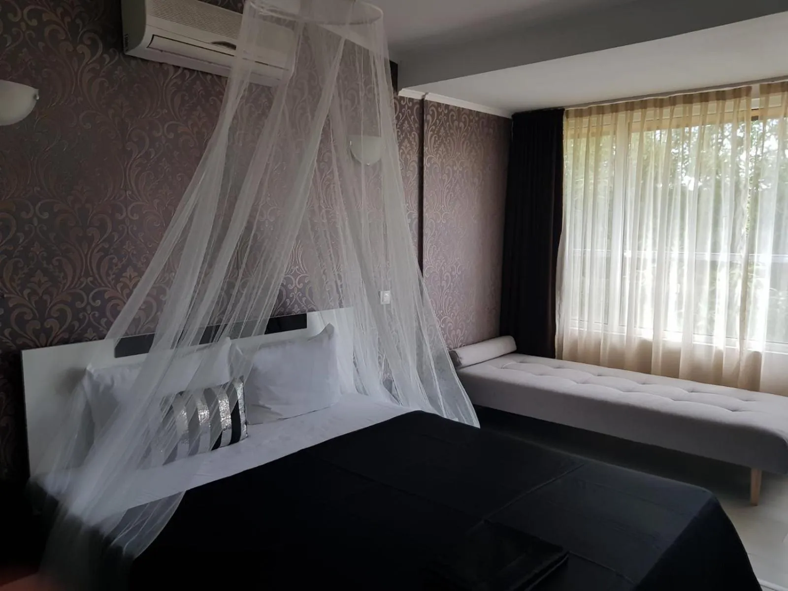 Bed in Sunrise Hotel