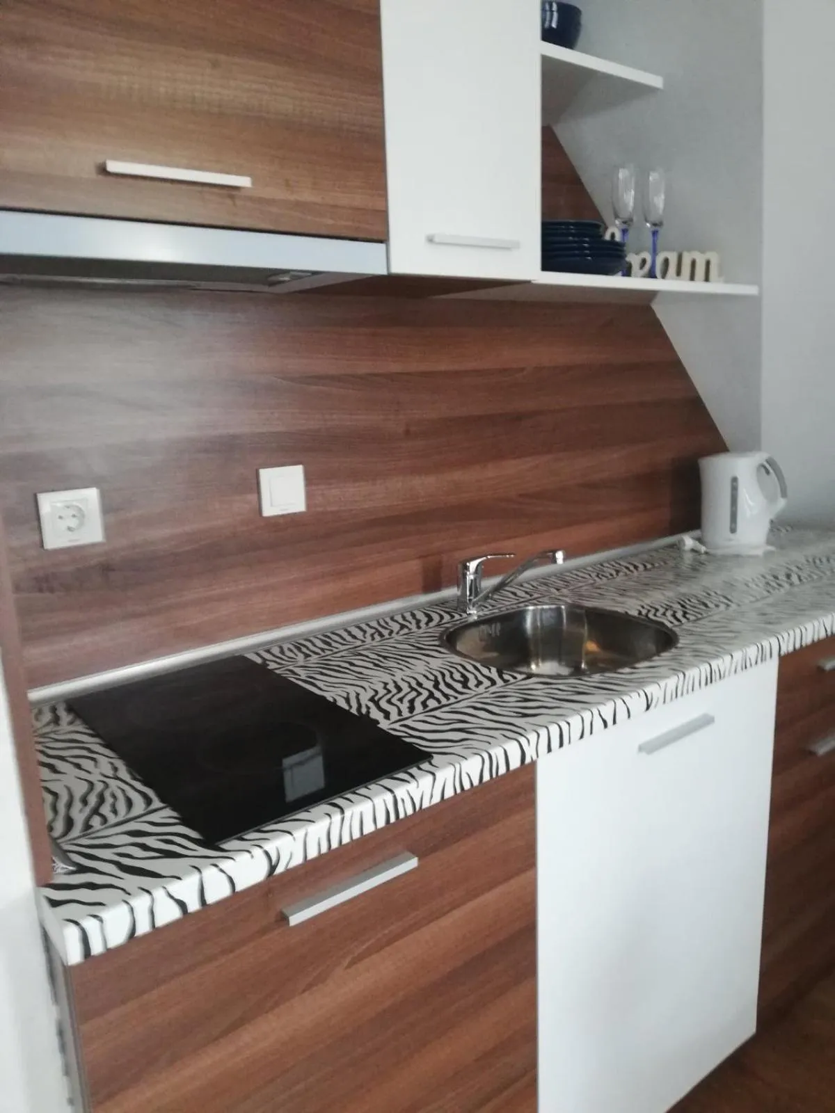 Kitchen or kitchenette in Sunrise Hotel