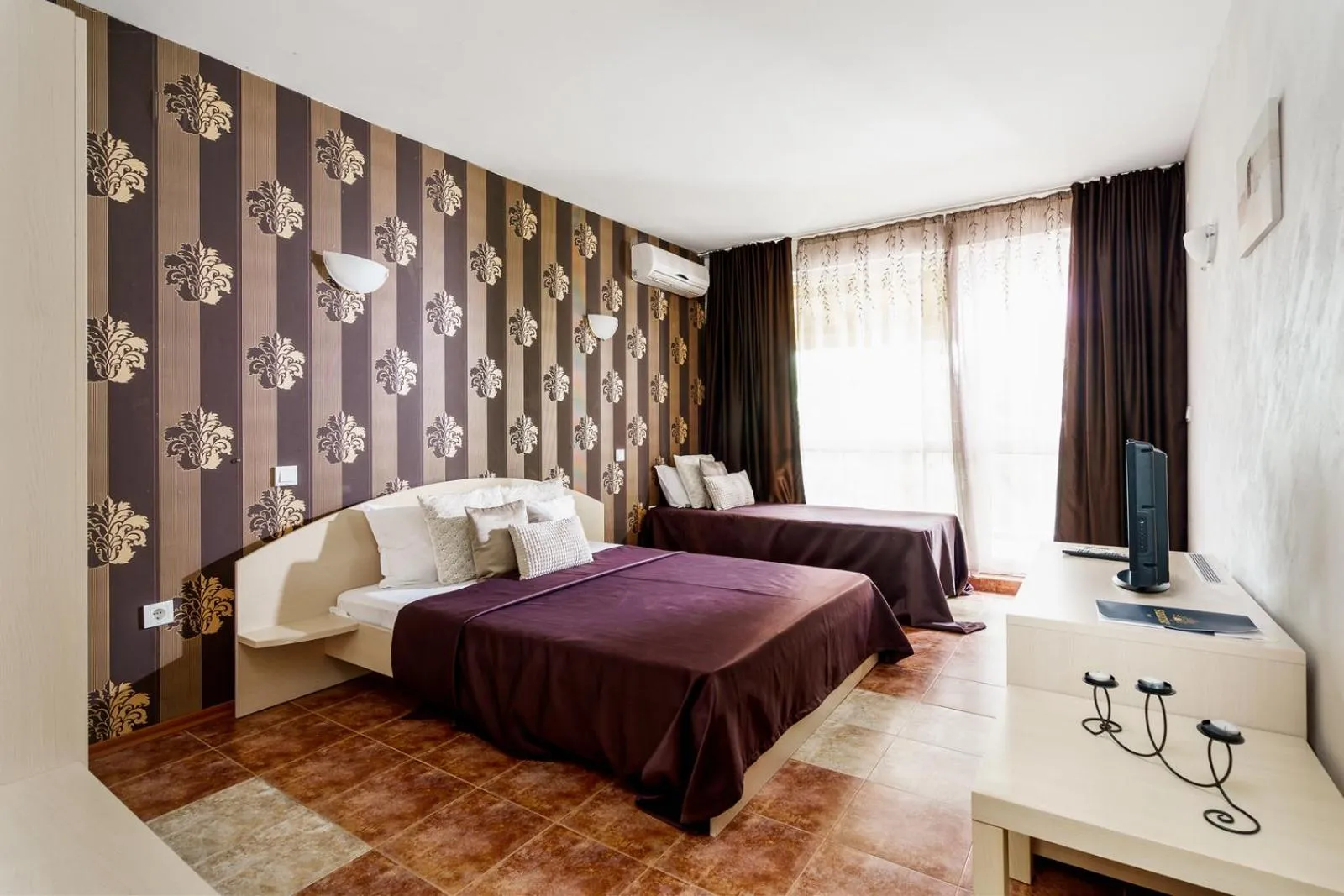 Bed in Sunrise Hotel