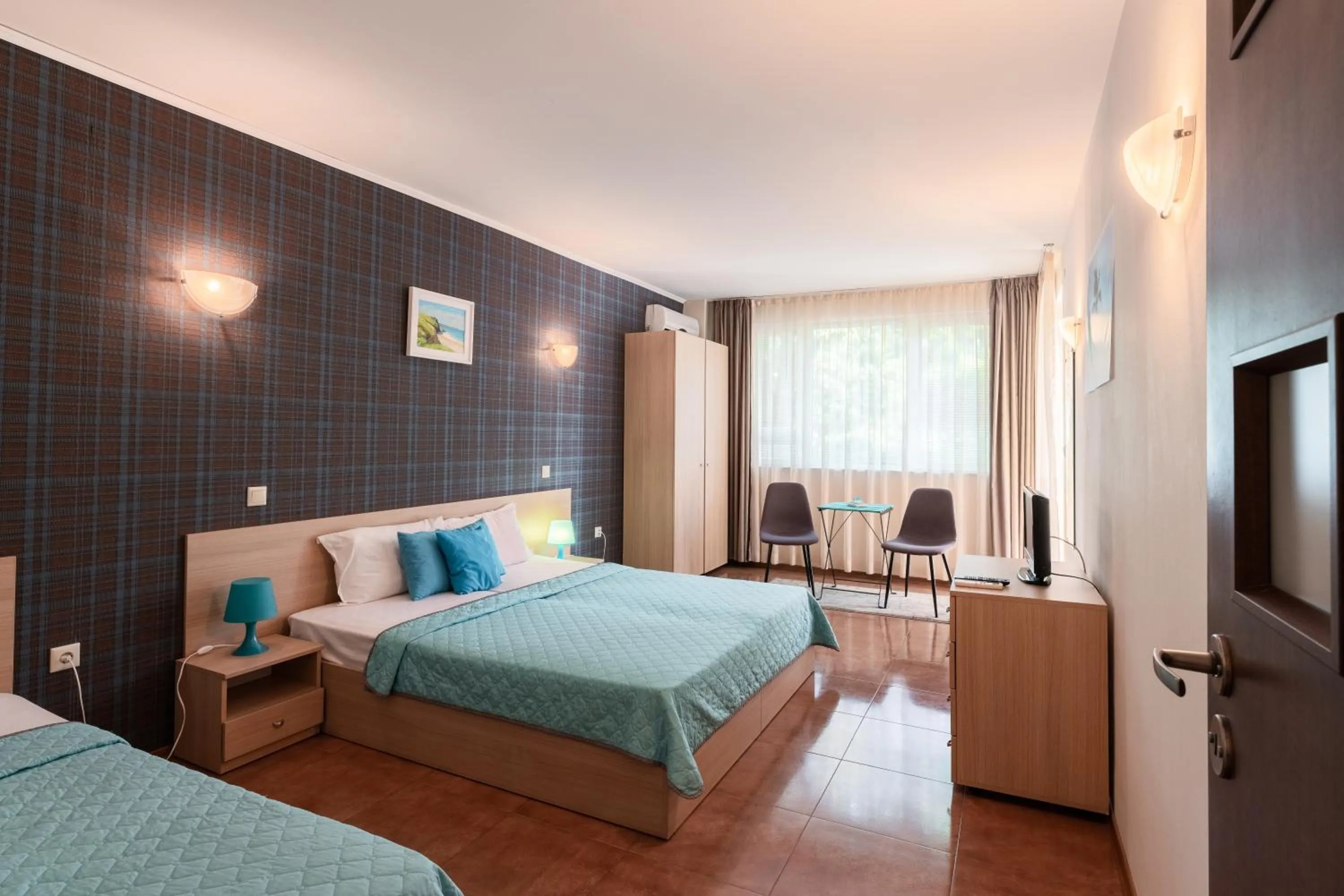 Bed in Sunrise Hotel