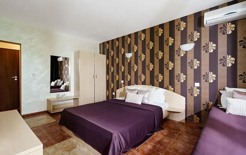 Bed in Sunrise Hotel