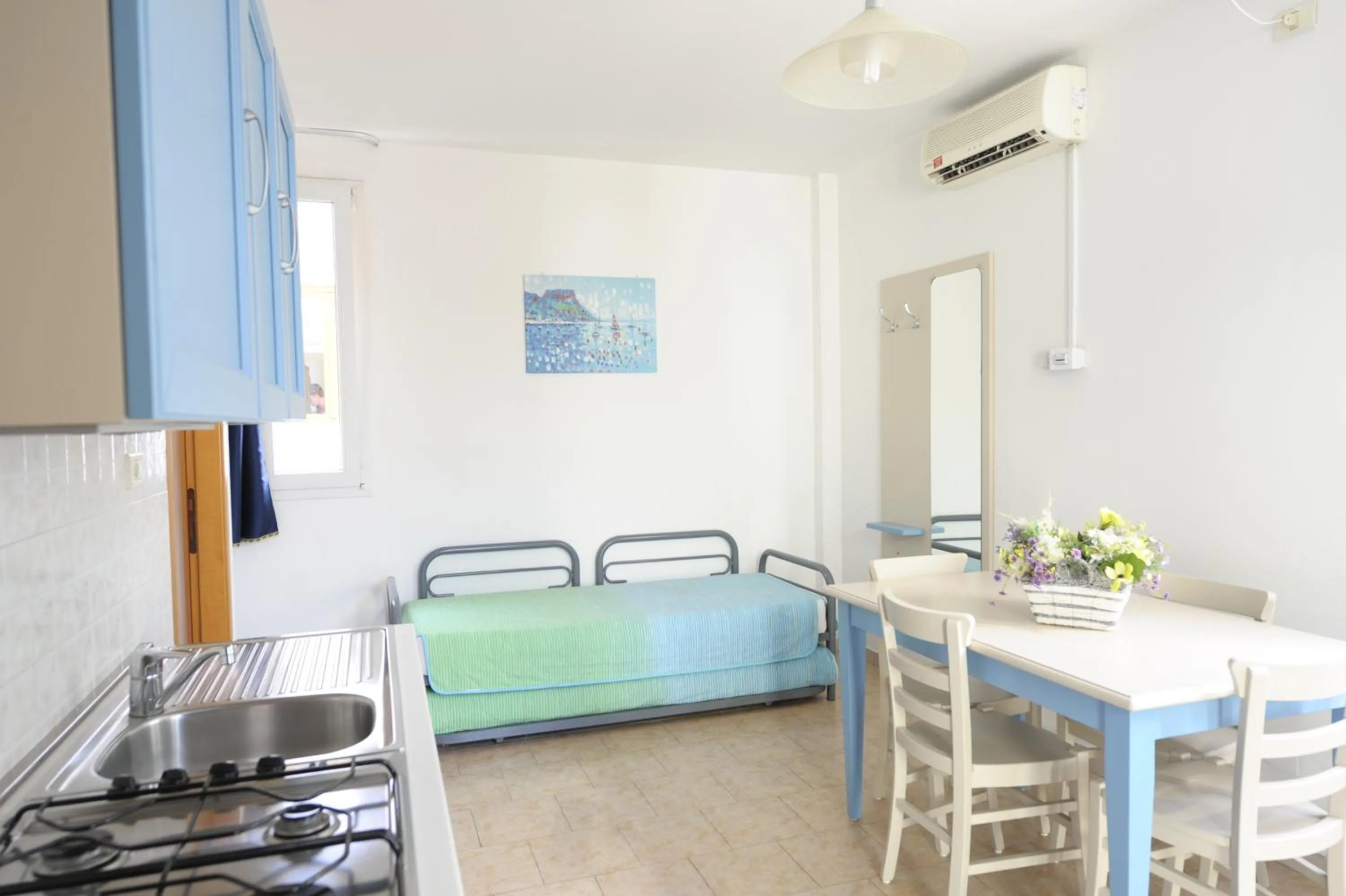 Kitchen or kitchenette in Camping Bella Italia