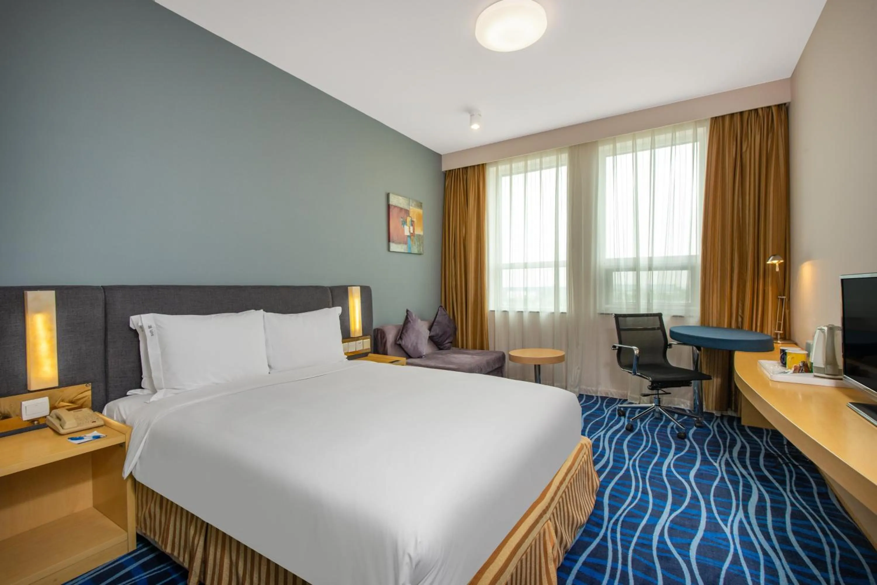 Photo of the whole room, Bed in Holiday Inn Express Tianjin Airport by IHG