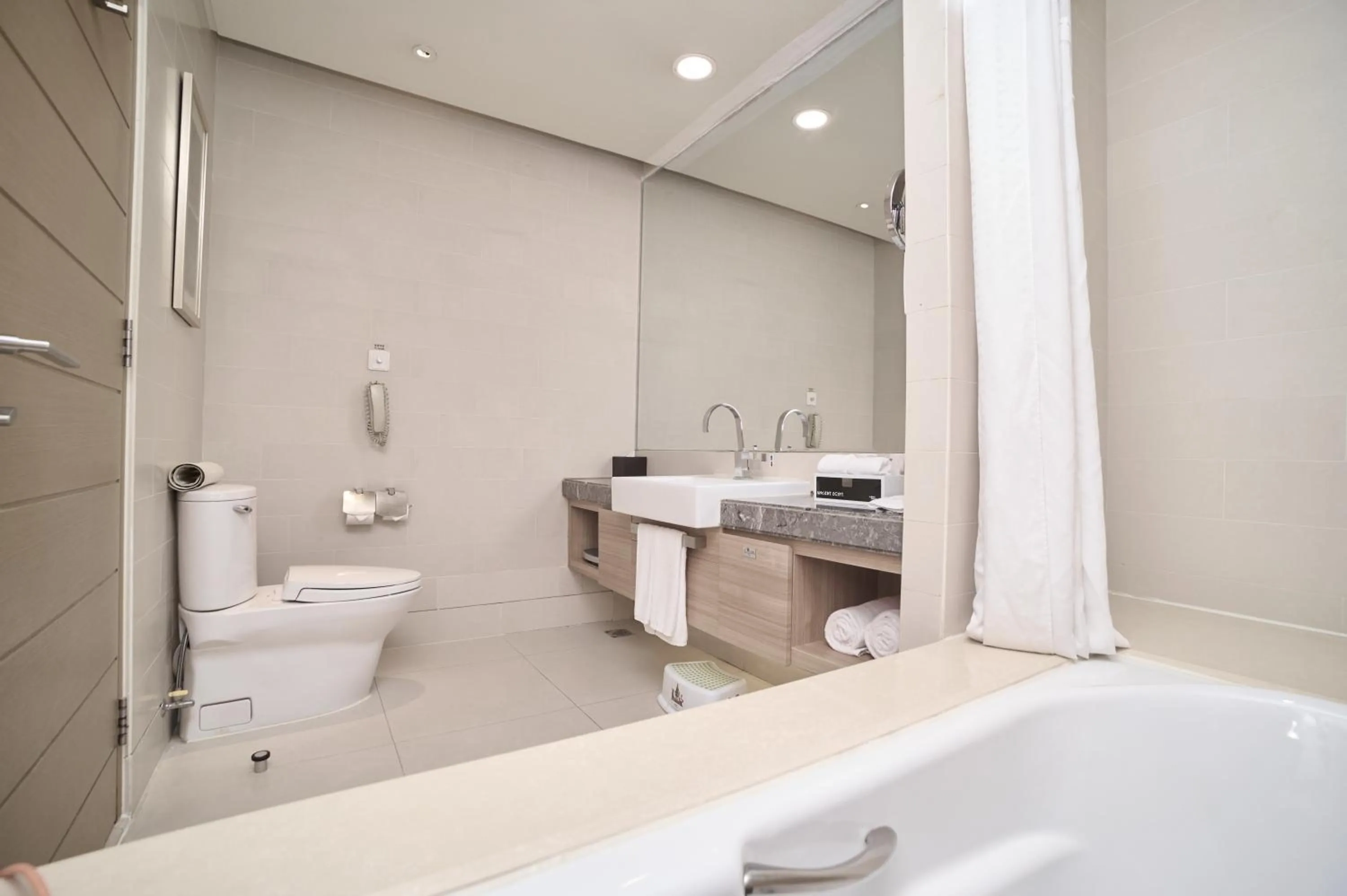 Toilet in Holiday Inn Tianjin Riverside by IHG