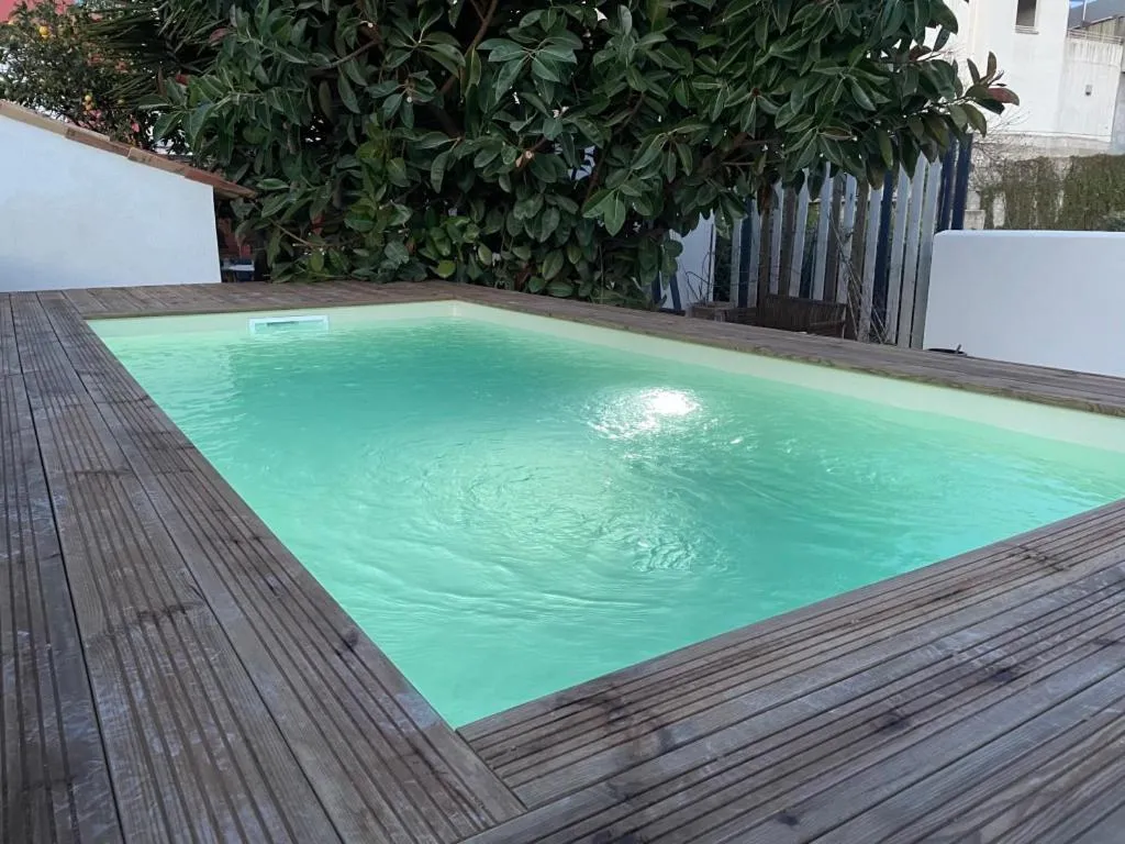 Swimming pool in Hôtel La Villa Patricia - Charme et Tradition