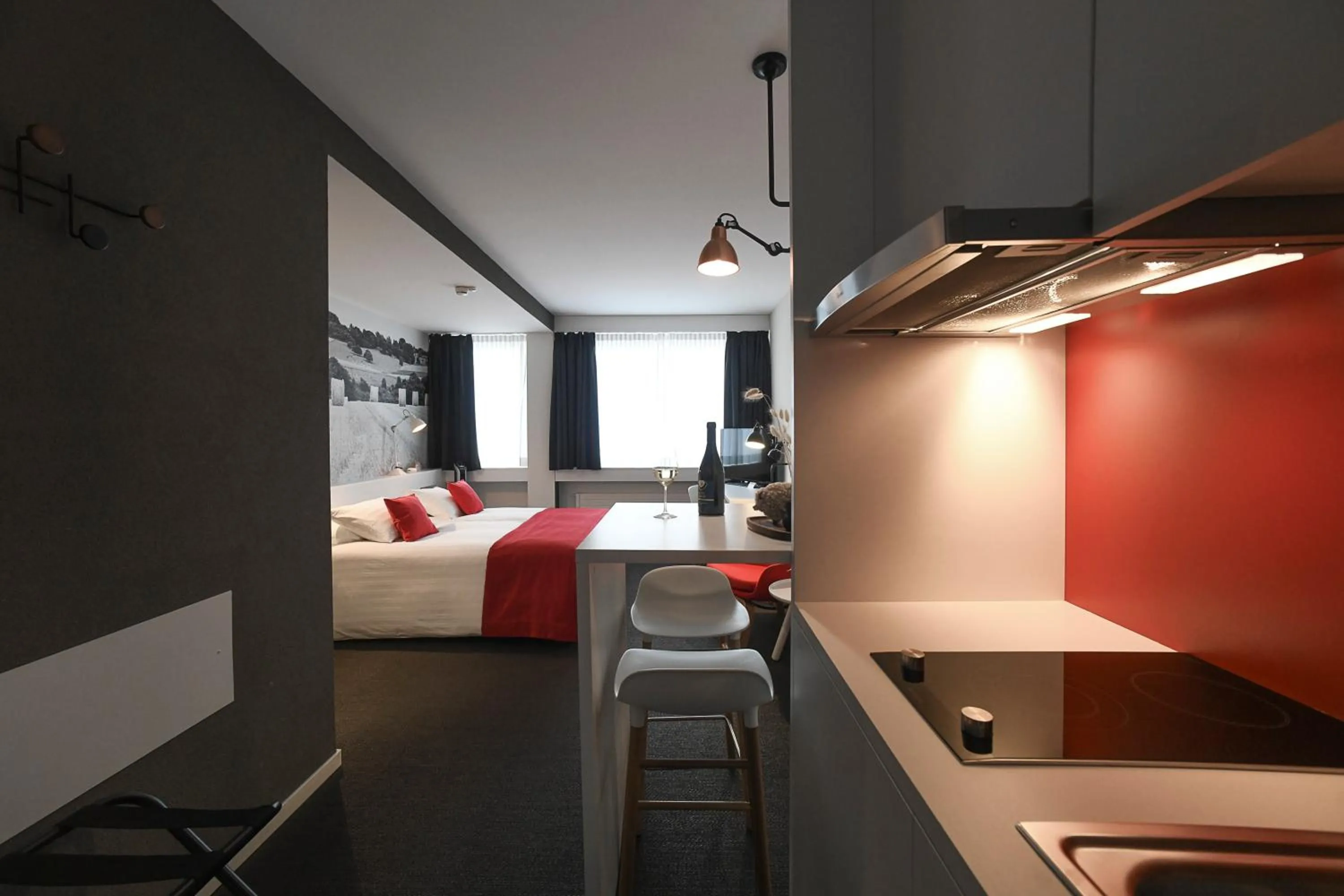 Kitchen or kitchenette, Bed in Home Swiss Hotel